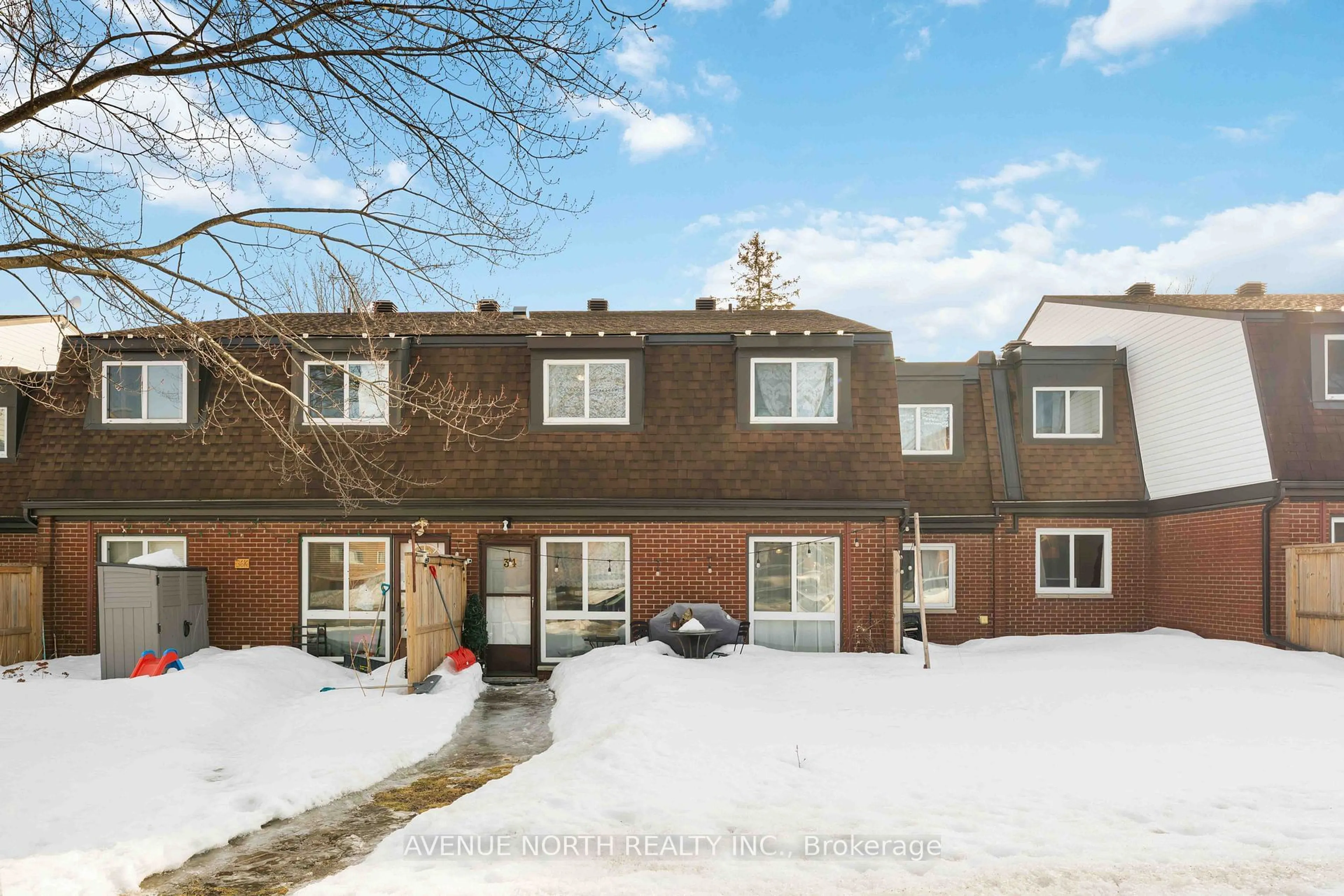 A pic from outside/outdoor area/front of a property/back of a property/a pic from drone, street for 1958 Jasmine Cres #34J, Ottawa Ontario K1J 7W1