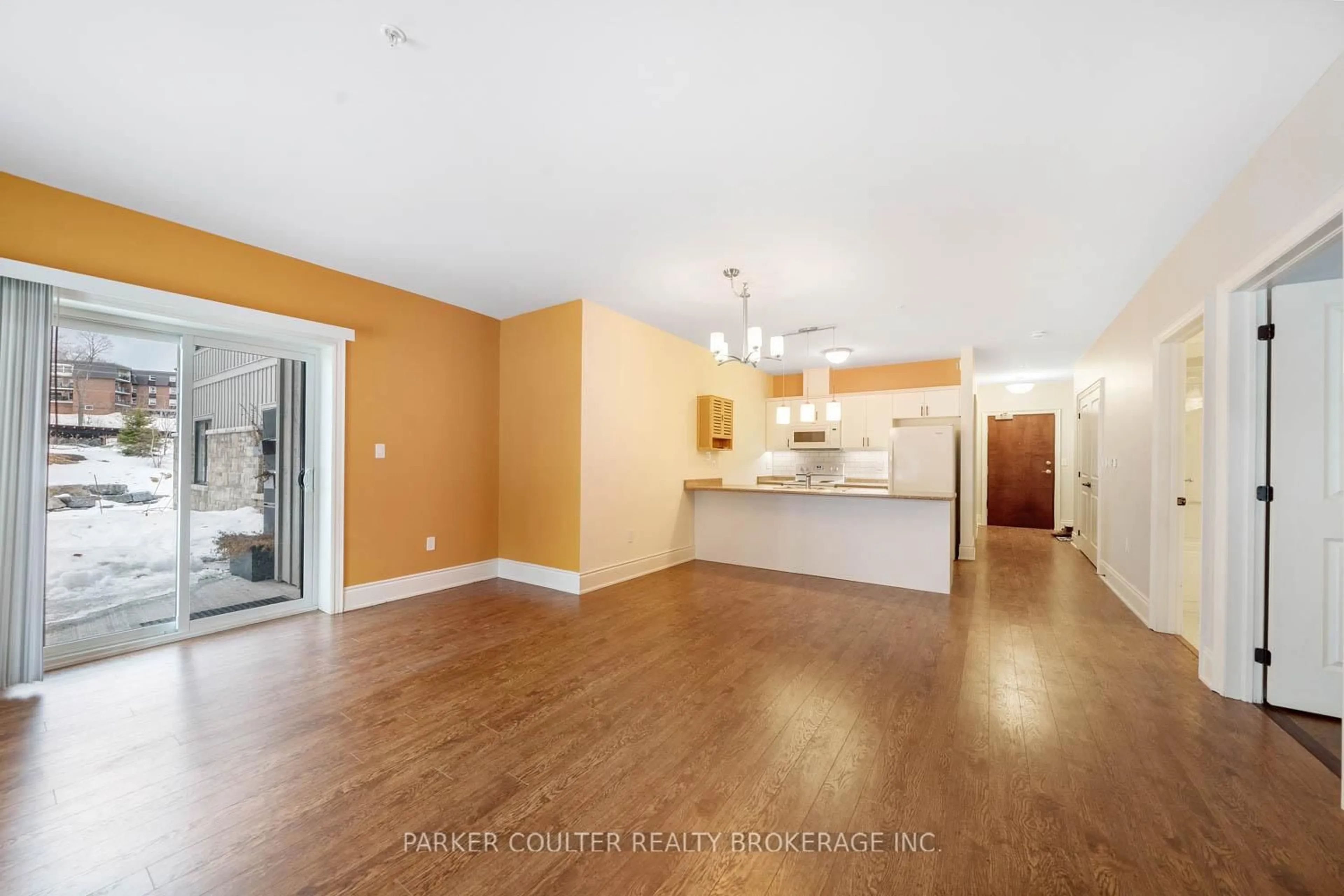 Open concept kitchen, wood/laminate floor for 11C Salt Dock Rd #104, Parry Sound Ontario P2A 3B6