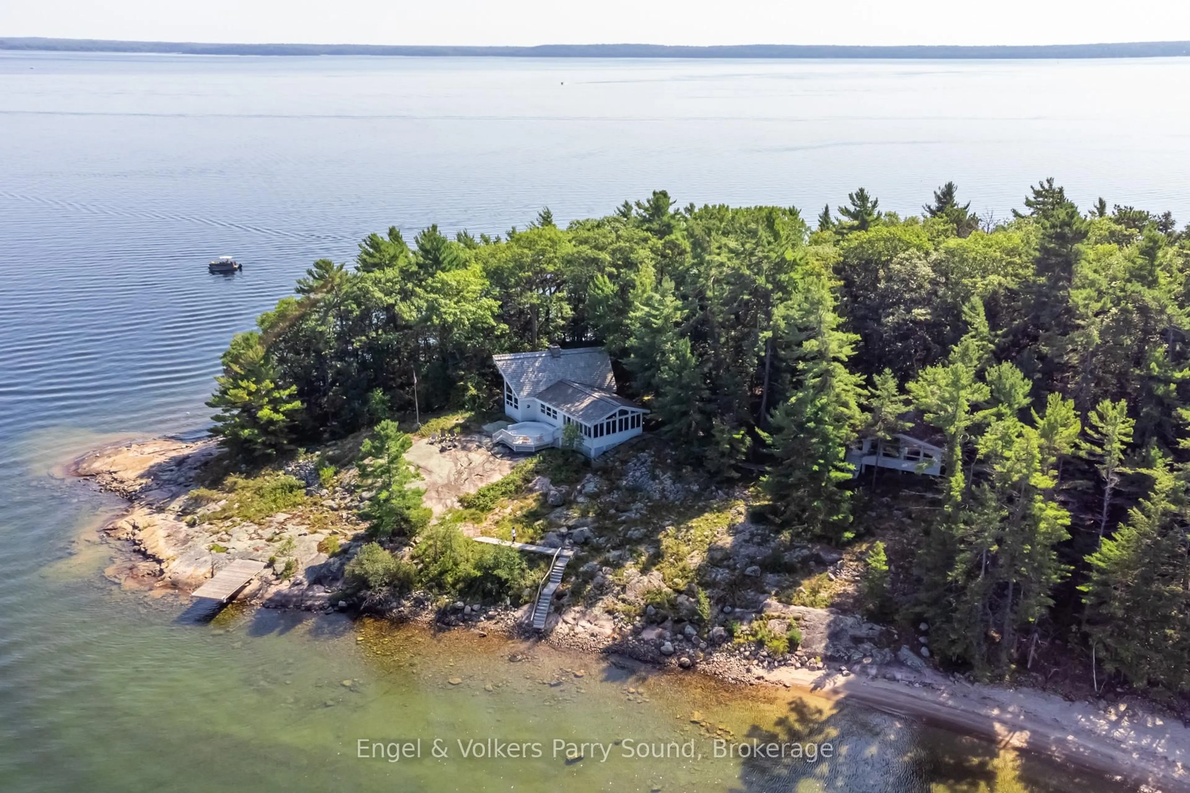 A pic from outside/outdoor area/front of a property/back of a property/a pic from drone, water/lake/river/ocean view for 8 ISLAND 29C N/A, Carling Ontario P0G 1G0