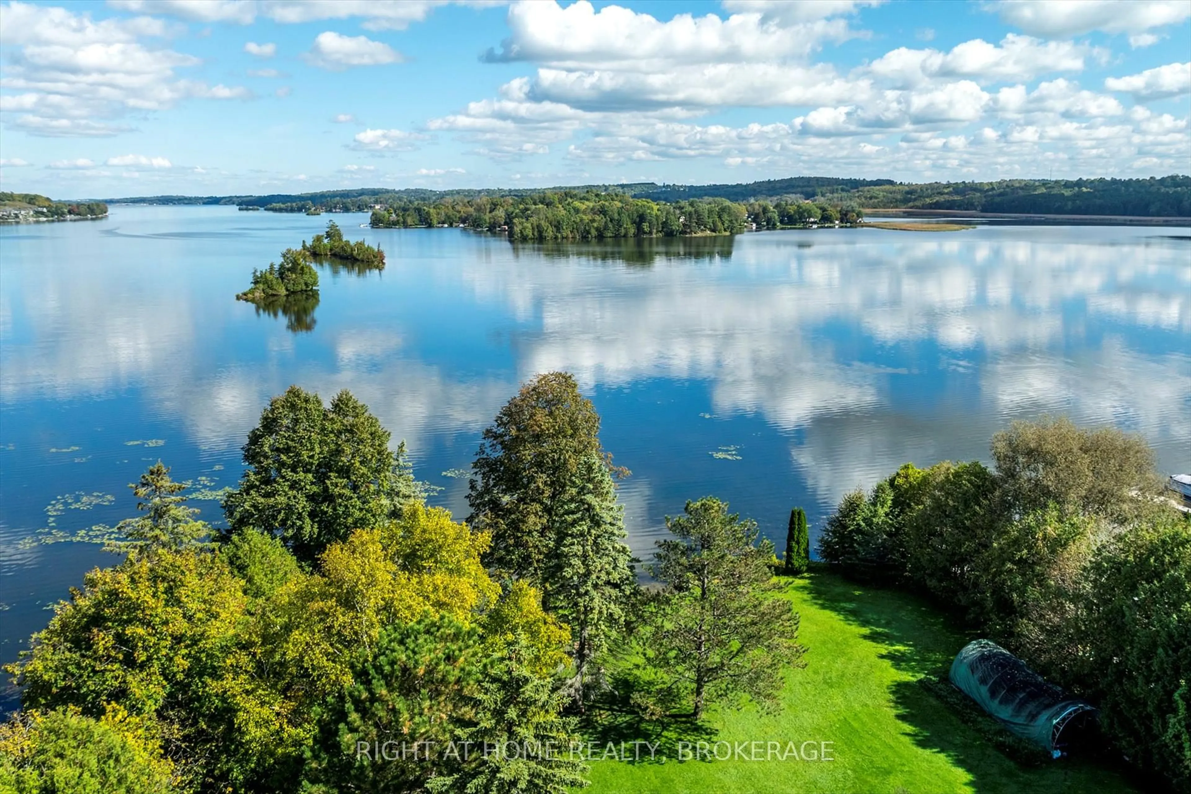 A pic from outside/outdoor area/front of a property/back of a property/a pic from drone, water/lake/river/ocean view for 10 Patricia Crt, Kawartha Lakes Ontario K9J 6X3