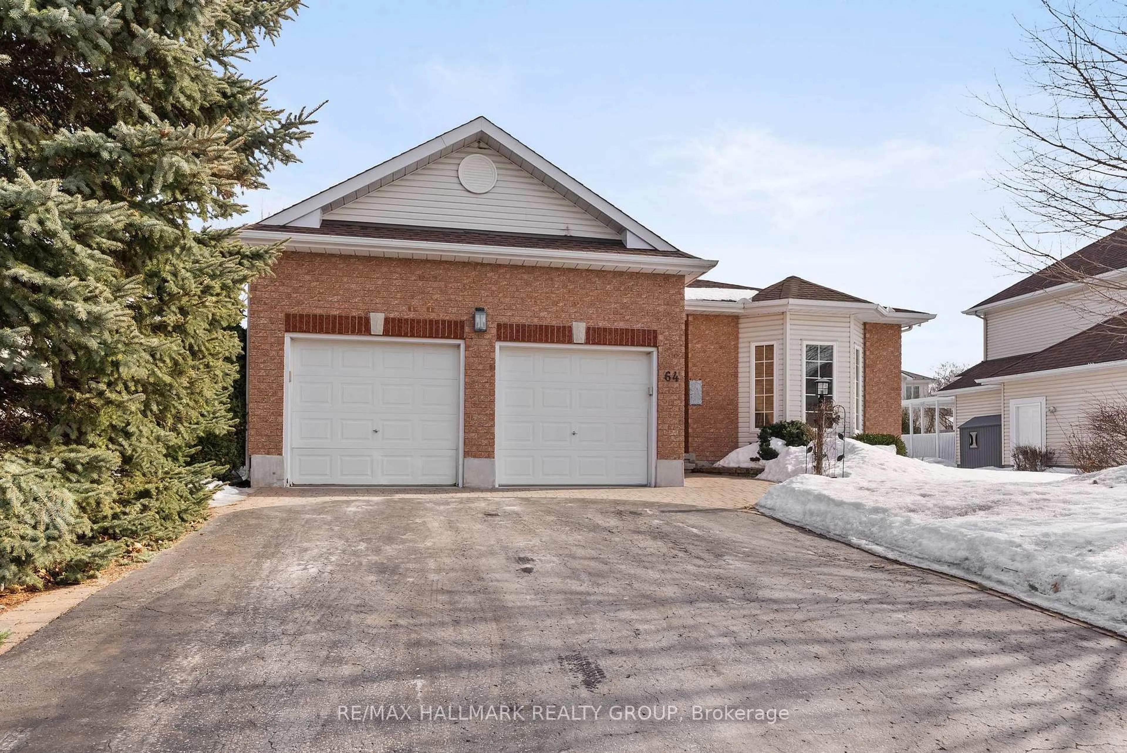 Home with brick exterior material, street for 64 Forest Creek Dr, Stittsville Ontario K2S 1M3