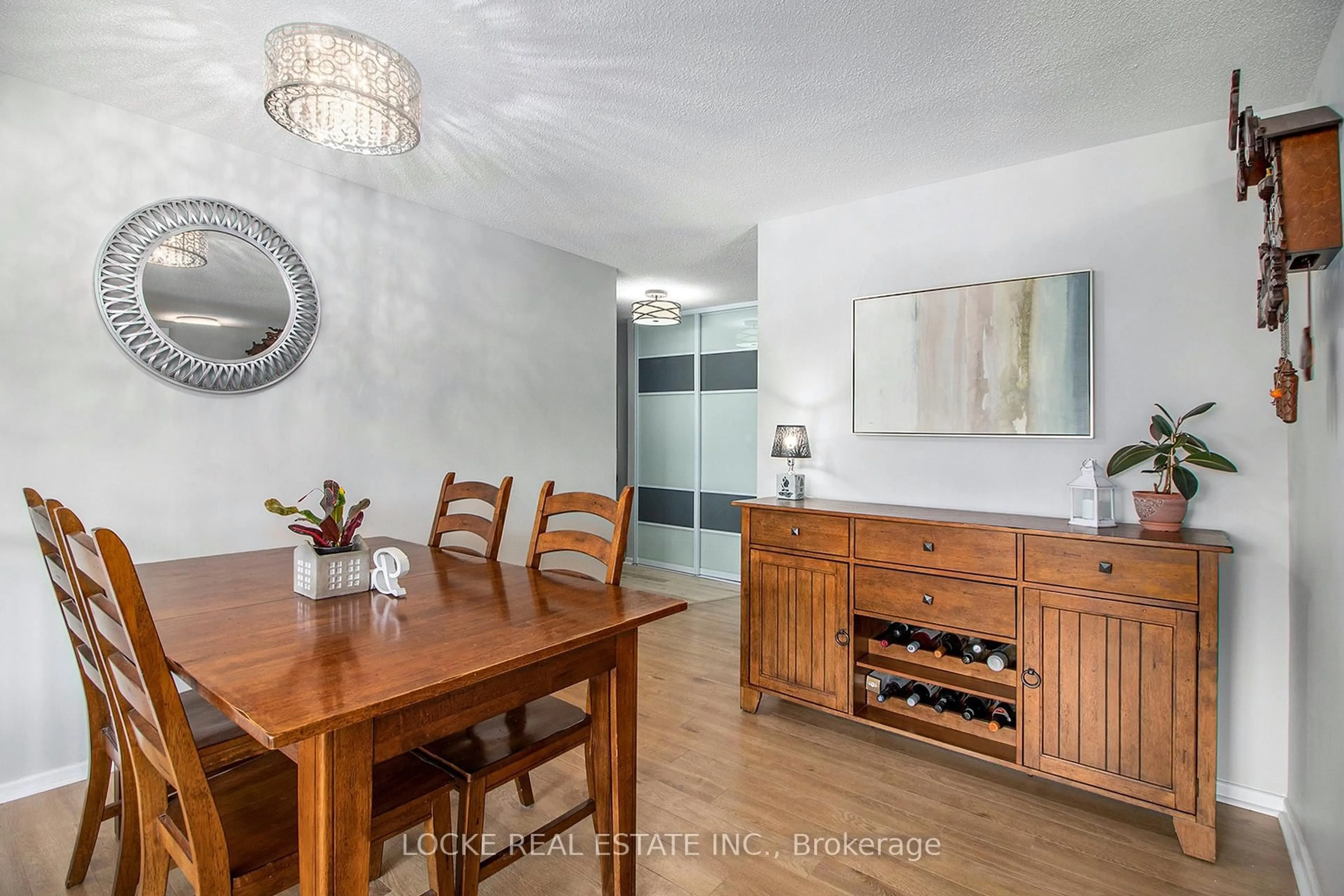 Dining room, wood/laminate floor for 1599 Lassiter Terr #516, Ottawa Ontario K1J 8R6