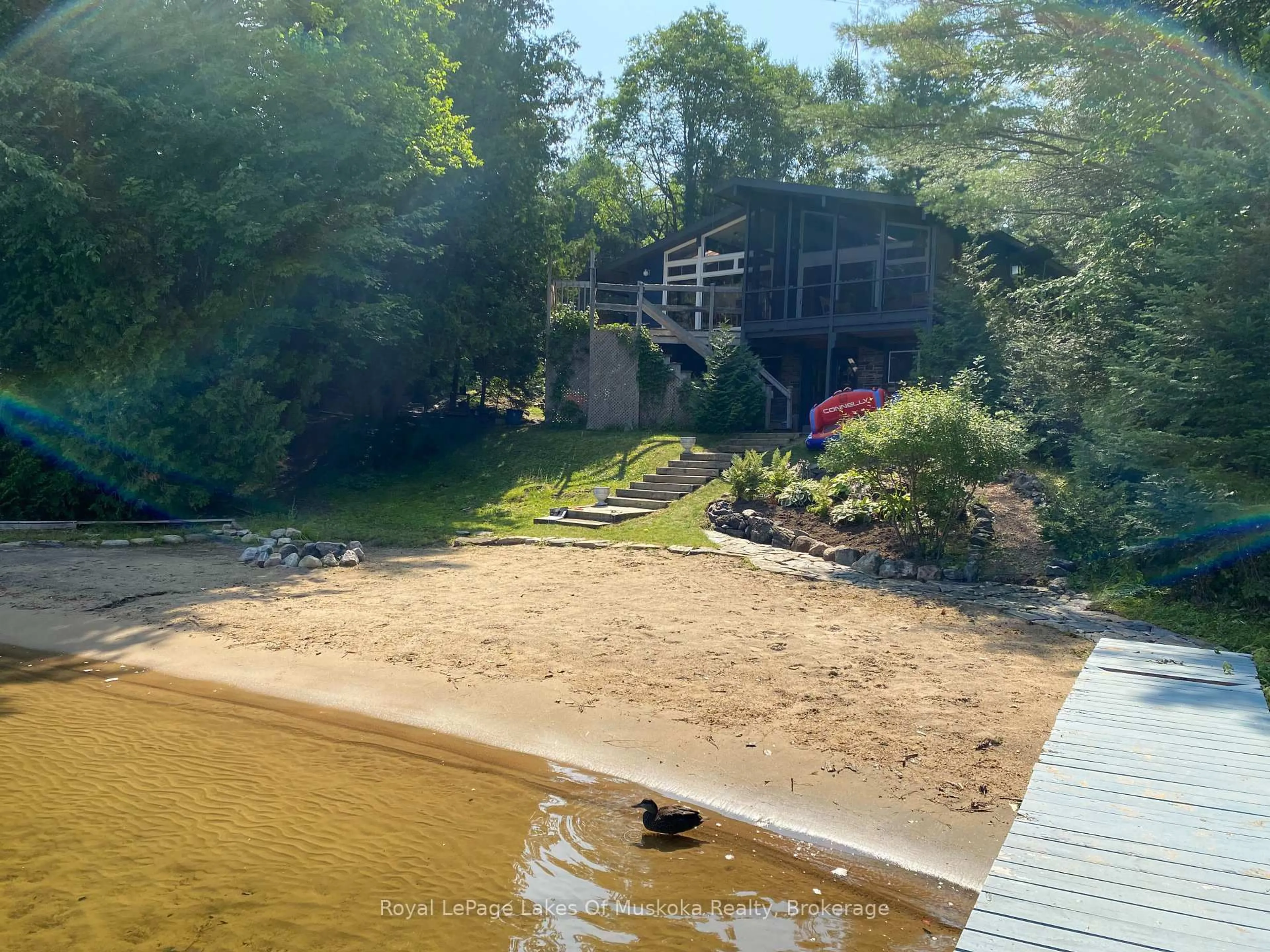 A pic from outside/outdoor area/front of a property/back of a property/a pic from drone, water/lake/river/ocean view for 1011 Hollow Point Dr, Algonquin Highlands Ontario P0A 1E0