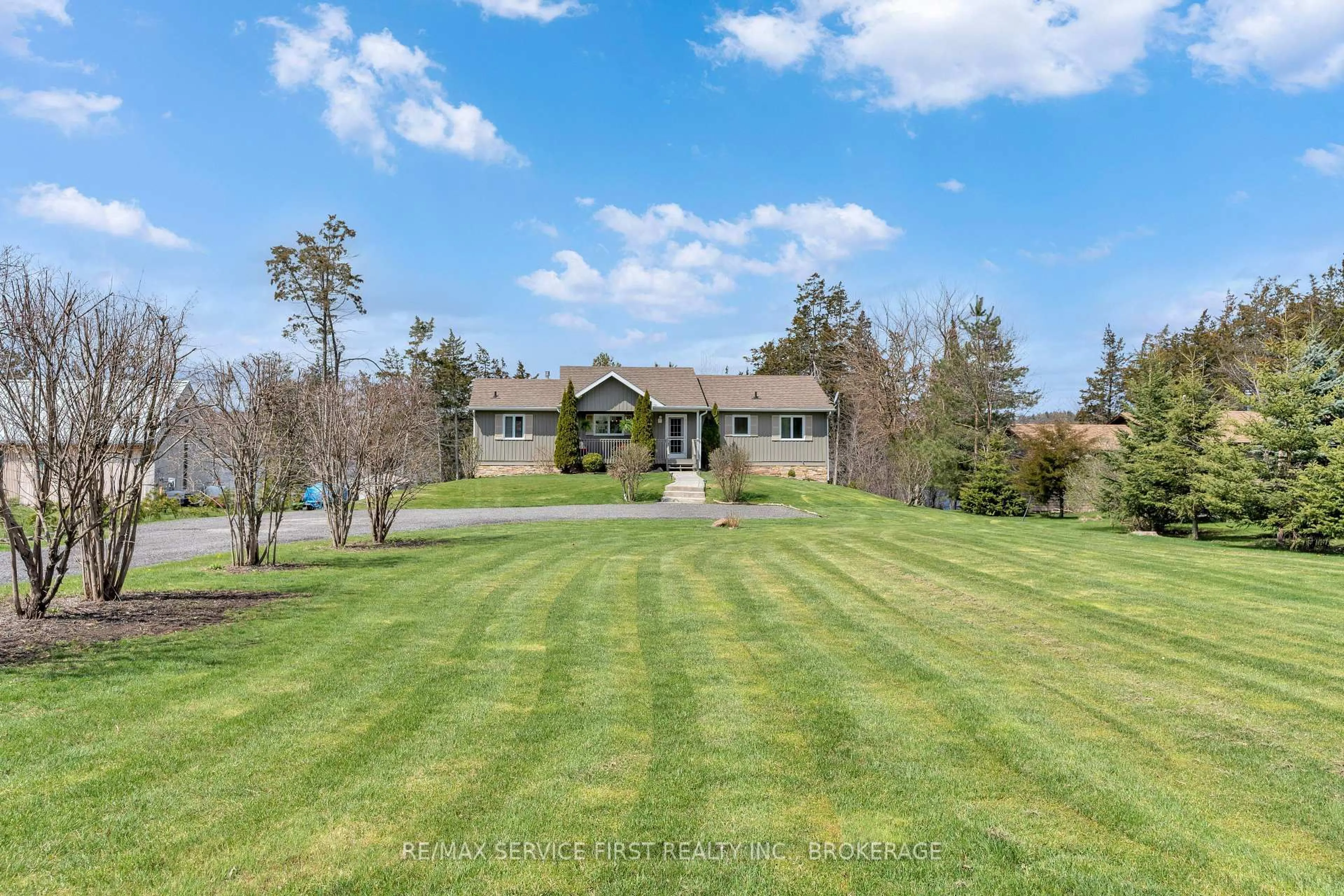 A pic from outside/outdoor area/front of a property/back of a property/a pic from drone, water/lake/river/ocean view for 502 Shermans Point Rd, Napanee Ontario K7R 3K8