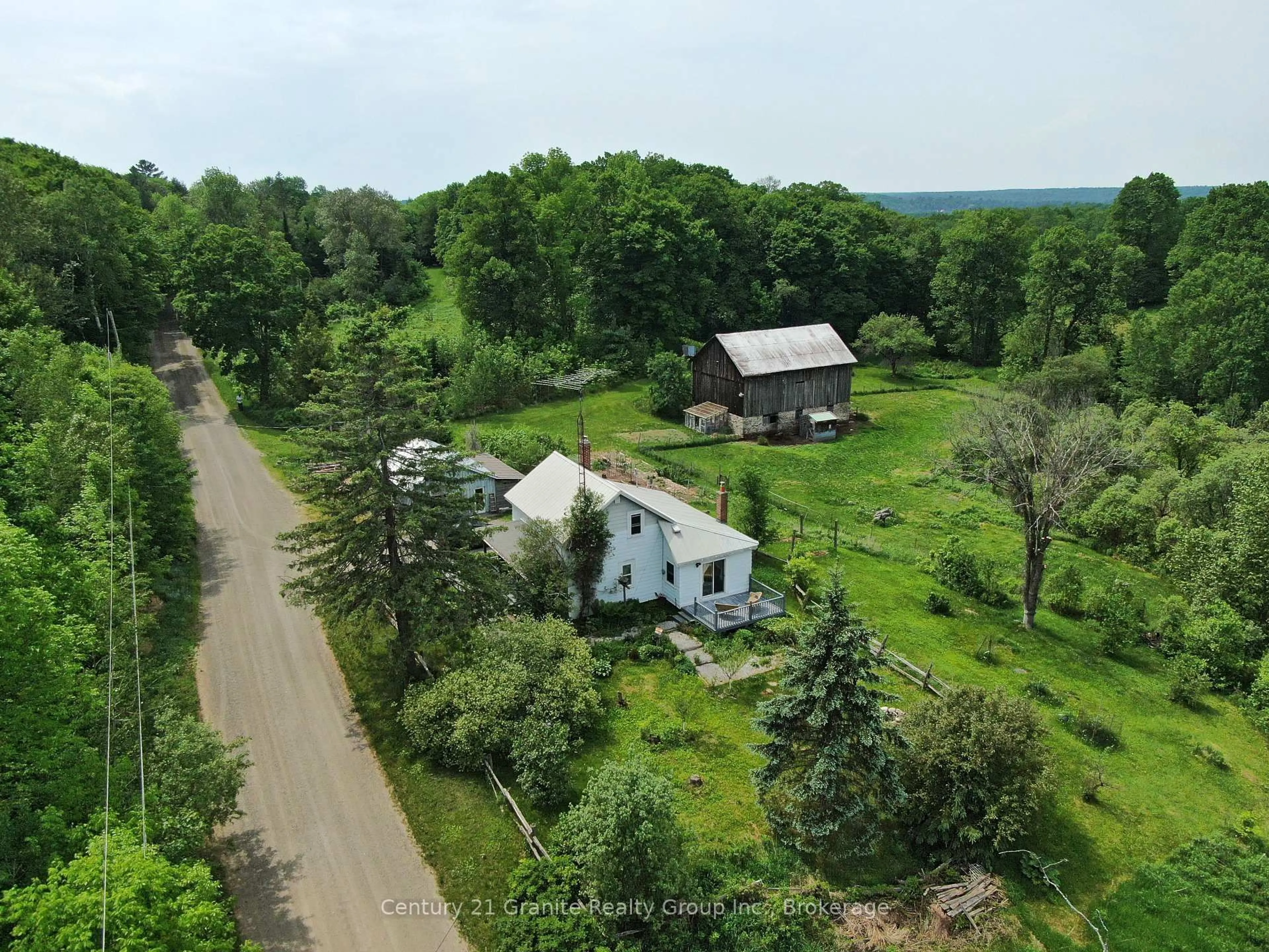 A pic from outside/outdoor area/front of a property/back of a property/a pic from drone, unknown for 1429 Tamarack Lake Rd, Highlands East Ontario K0M 1R0