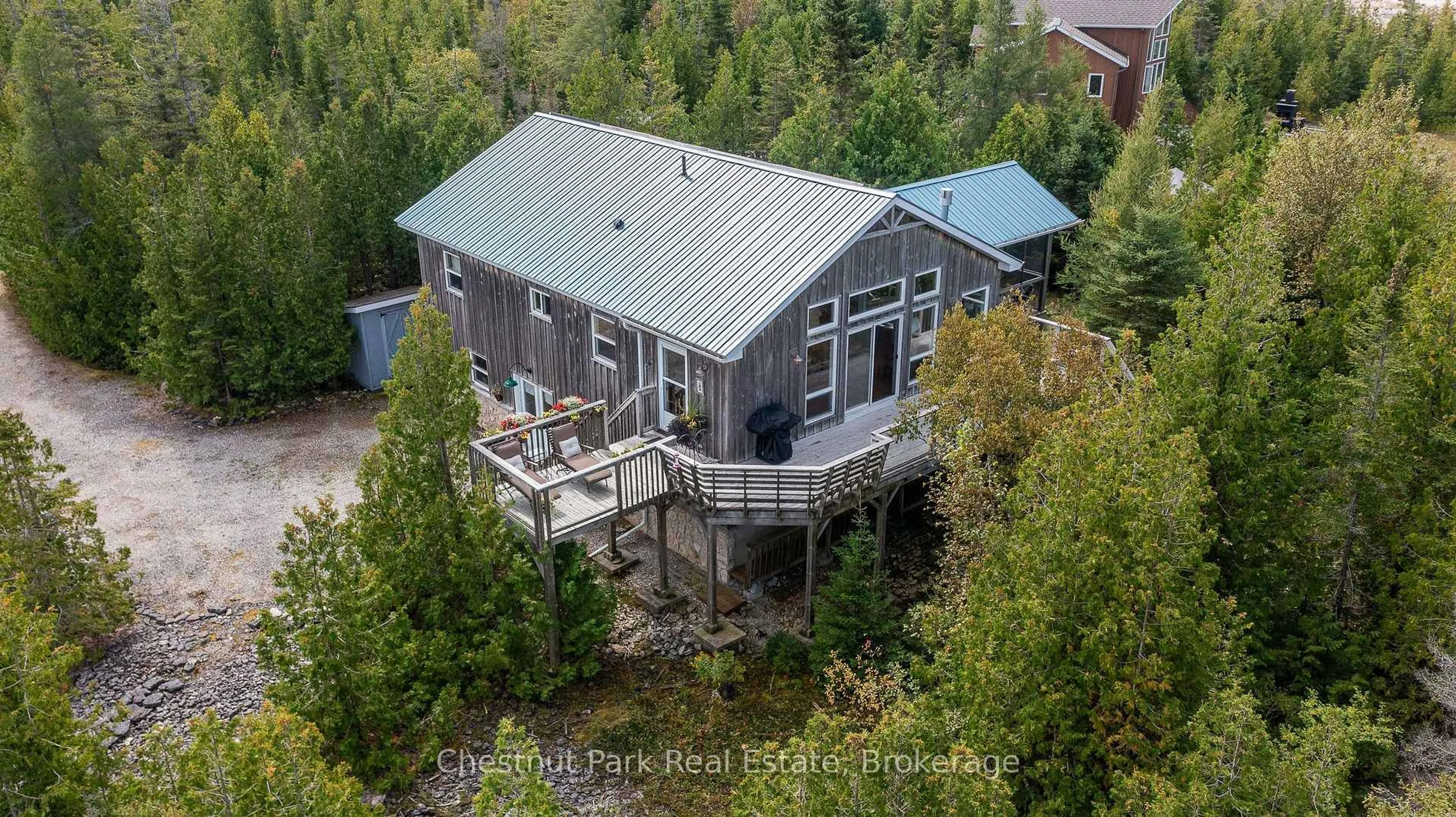 A pic from outside/outdoor area/front of a property/back of a property/a pic from drone, unknown for 130 Pine Tree Harbour Rd, Northern Bruce Peninsula Ontario N0H 1Z0