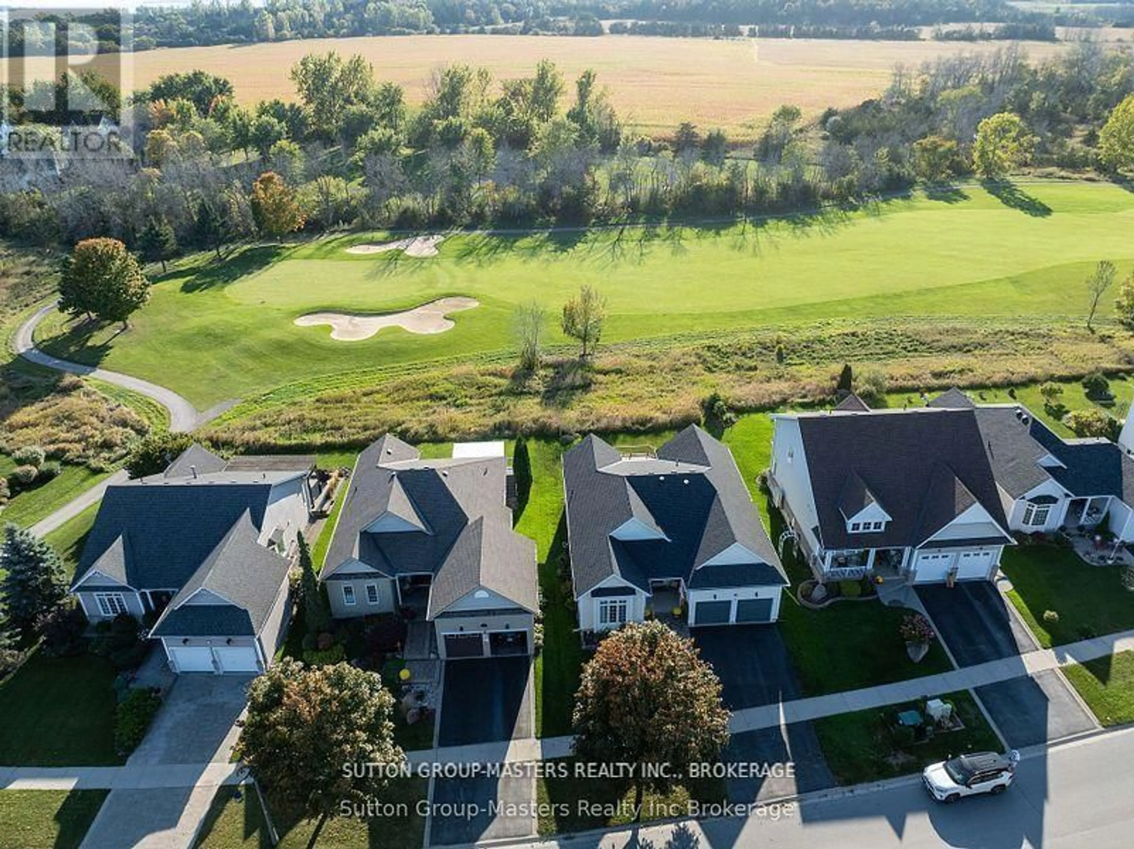 A pic from outside/outdoor area/front of a property/back of a property/a pic from drone, water/lake/river/ocean view for 44 COUNTRY CLUB Dr, Bath Ontario K0H 1G0