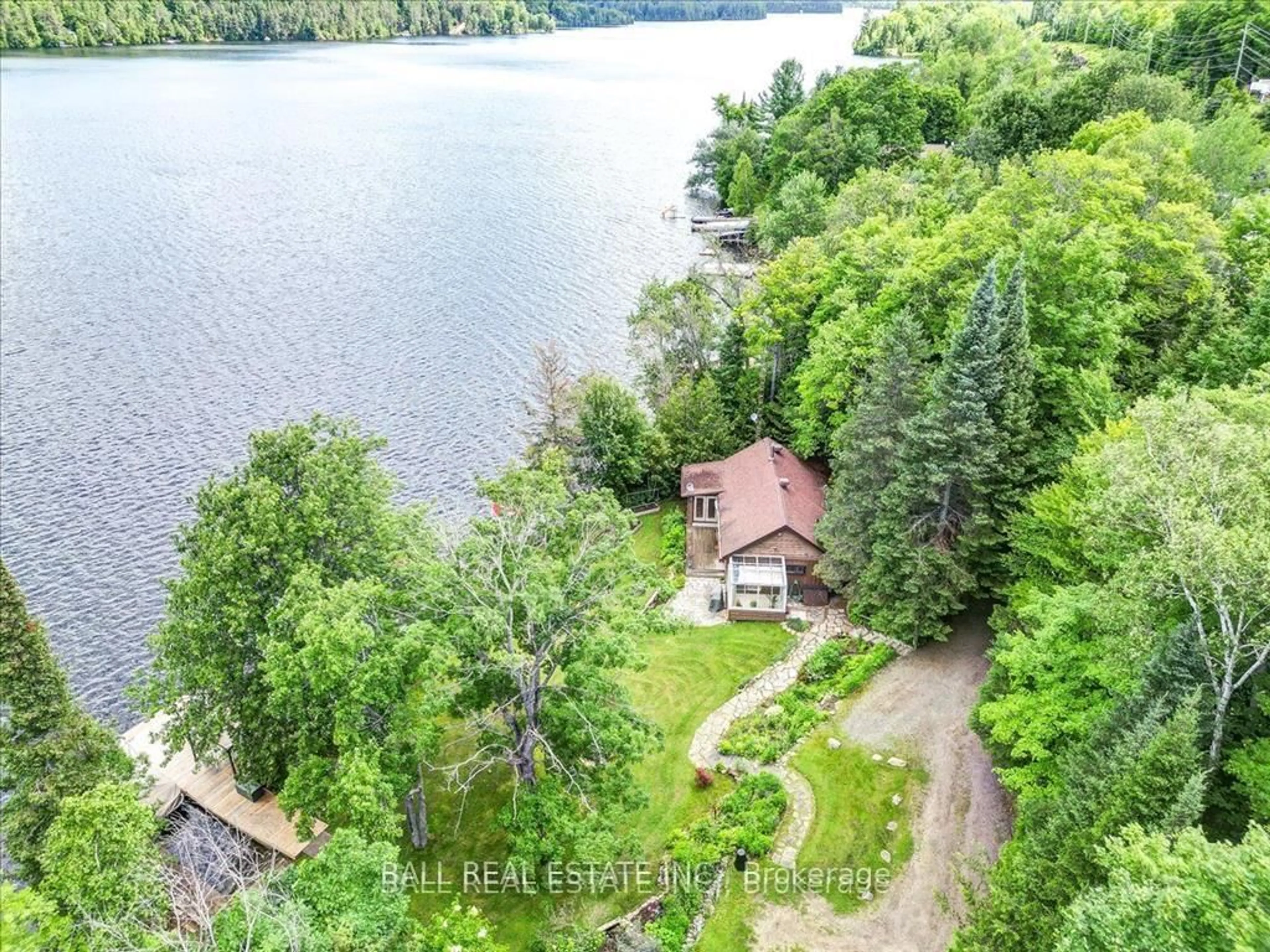 A pic from outside/outdoor area/front of a property/back of a property/a pic from drone, water/lake/river/ocean view for 26909 Highway 28 N/A, Highlands East Ontario K0L 1M0