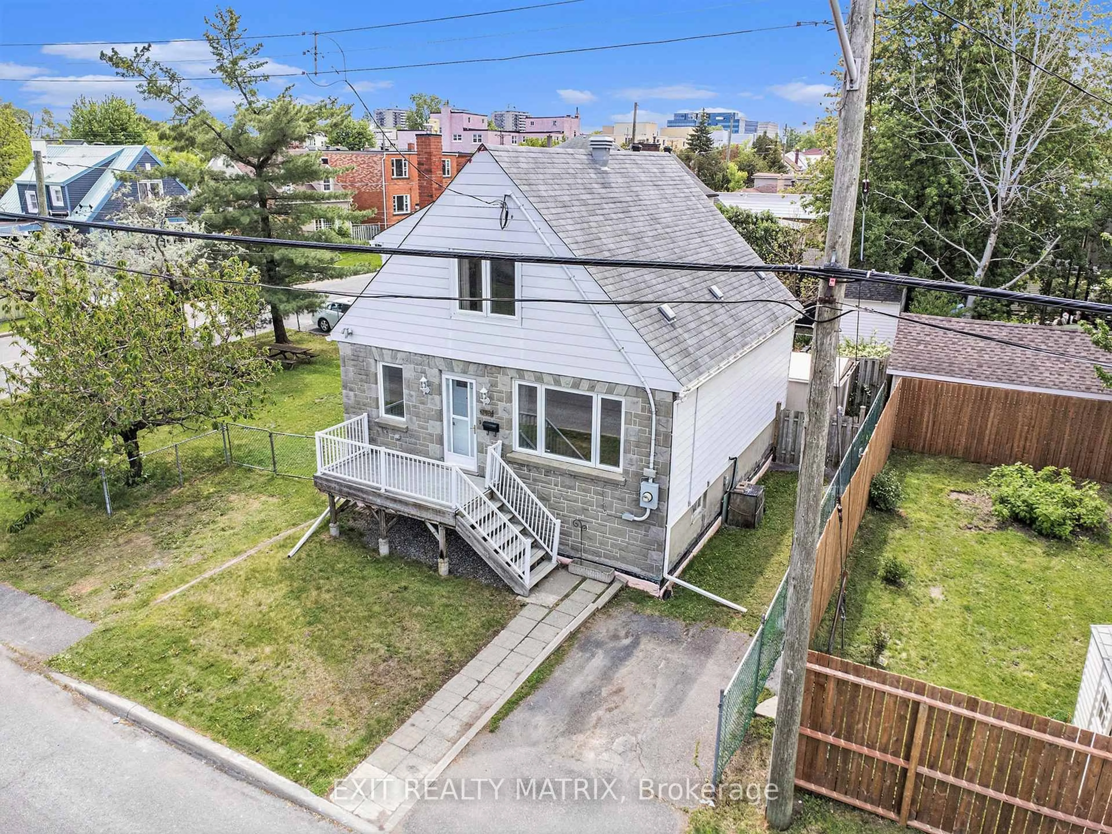 A pic from outside/outdoor area/front of a property/back of a property/a pic from drone, street for 348 LAFONTAINE Ave, Ottawa Ontario K1L 6X5