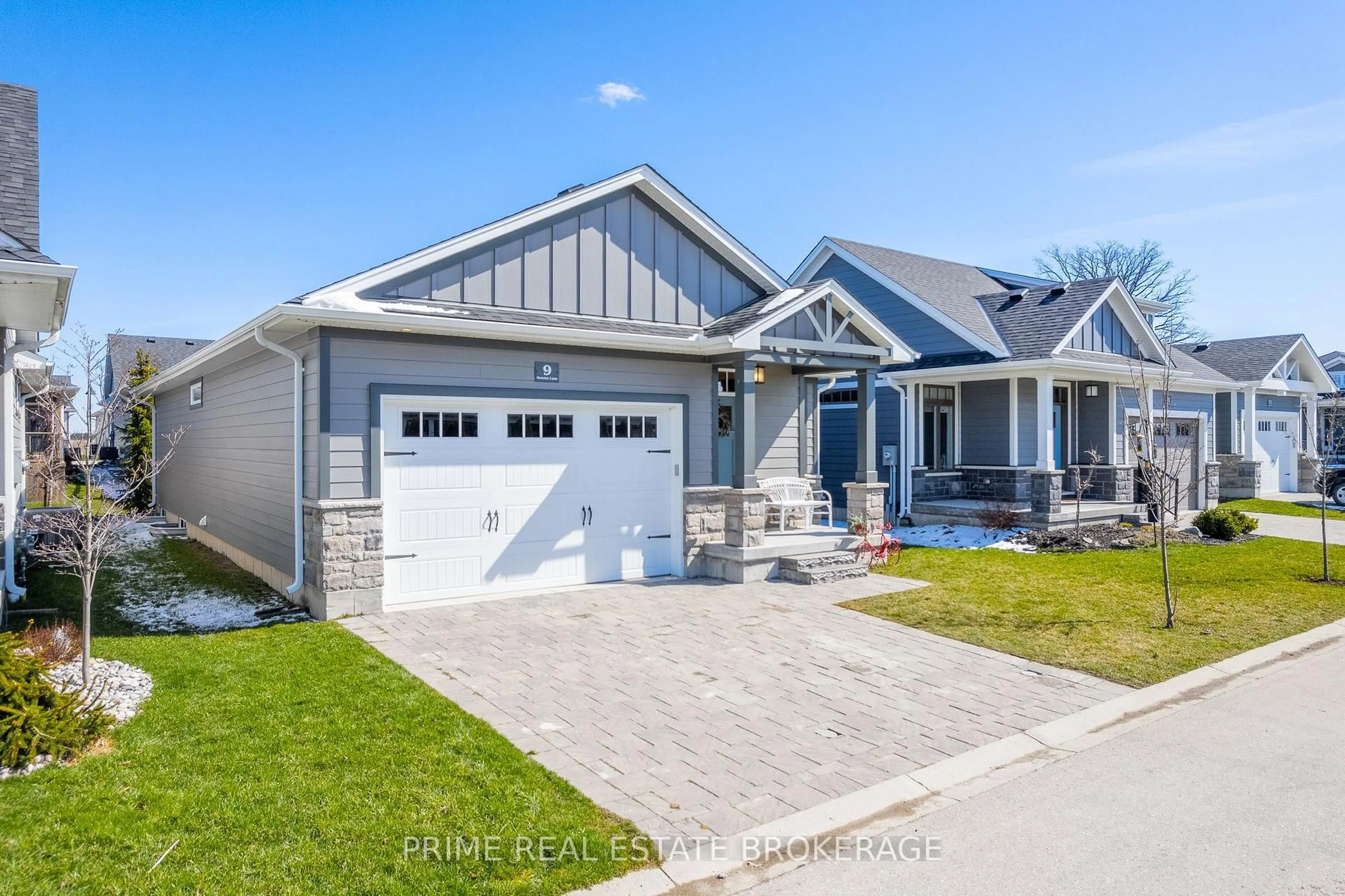 Home with vinyl exterior material, street for 9 SUNRISE Lane, Lambton Shores Ontario N0M 1T0