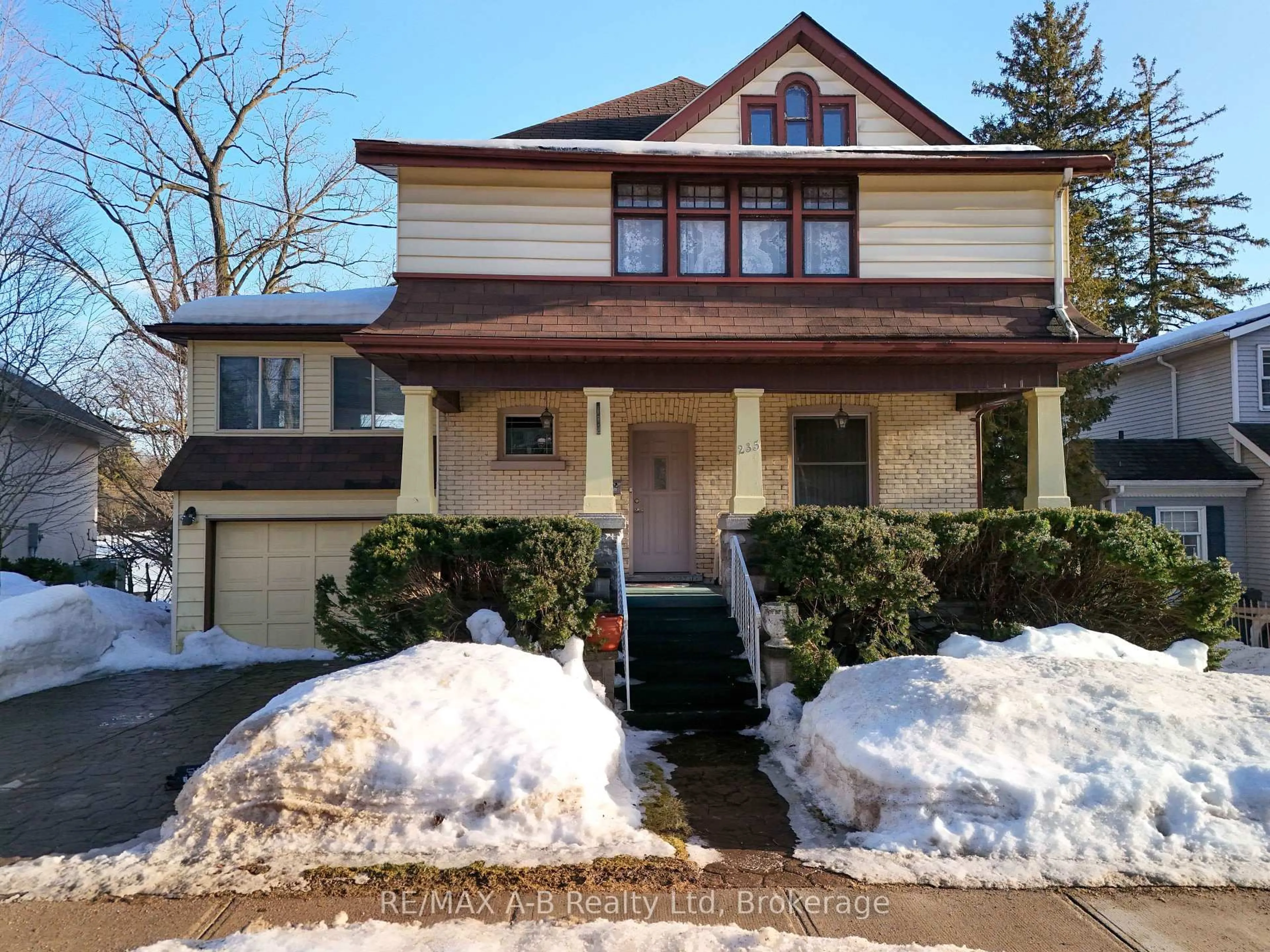 Home with vinyl exterior material, street for 235 William St, Stratford Ontario N5A 4Y2