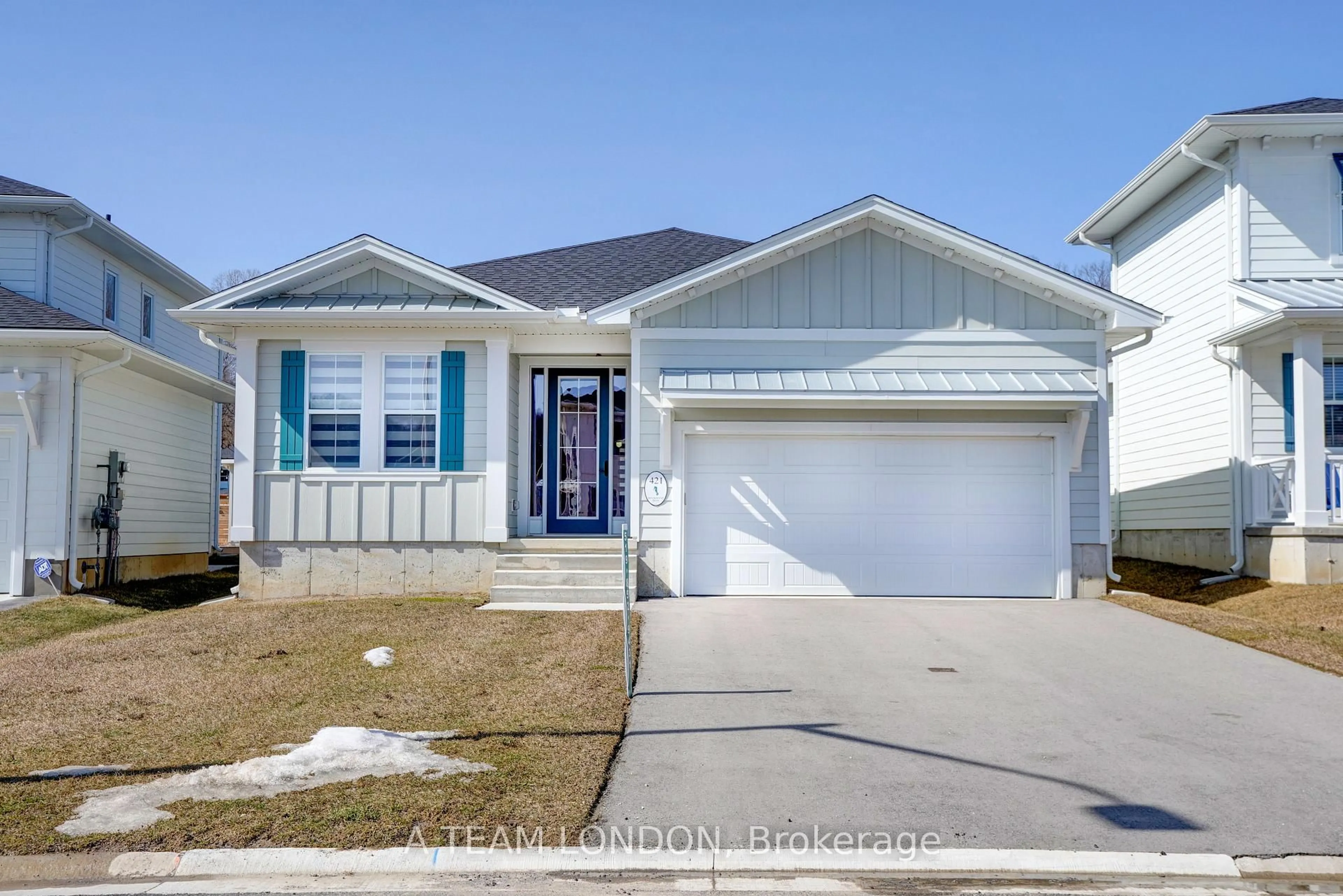 Home with vinyl exterior material, street for 421 BREAKWATER Blvd, Central Elgin Ontario N5L 1C5