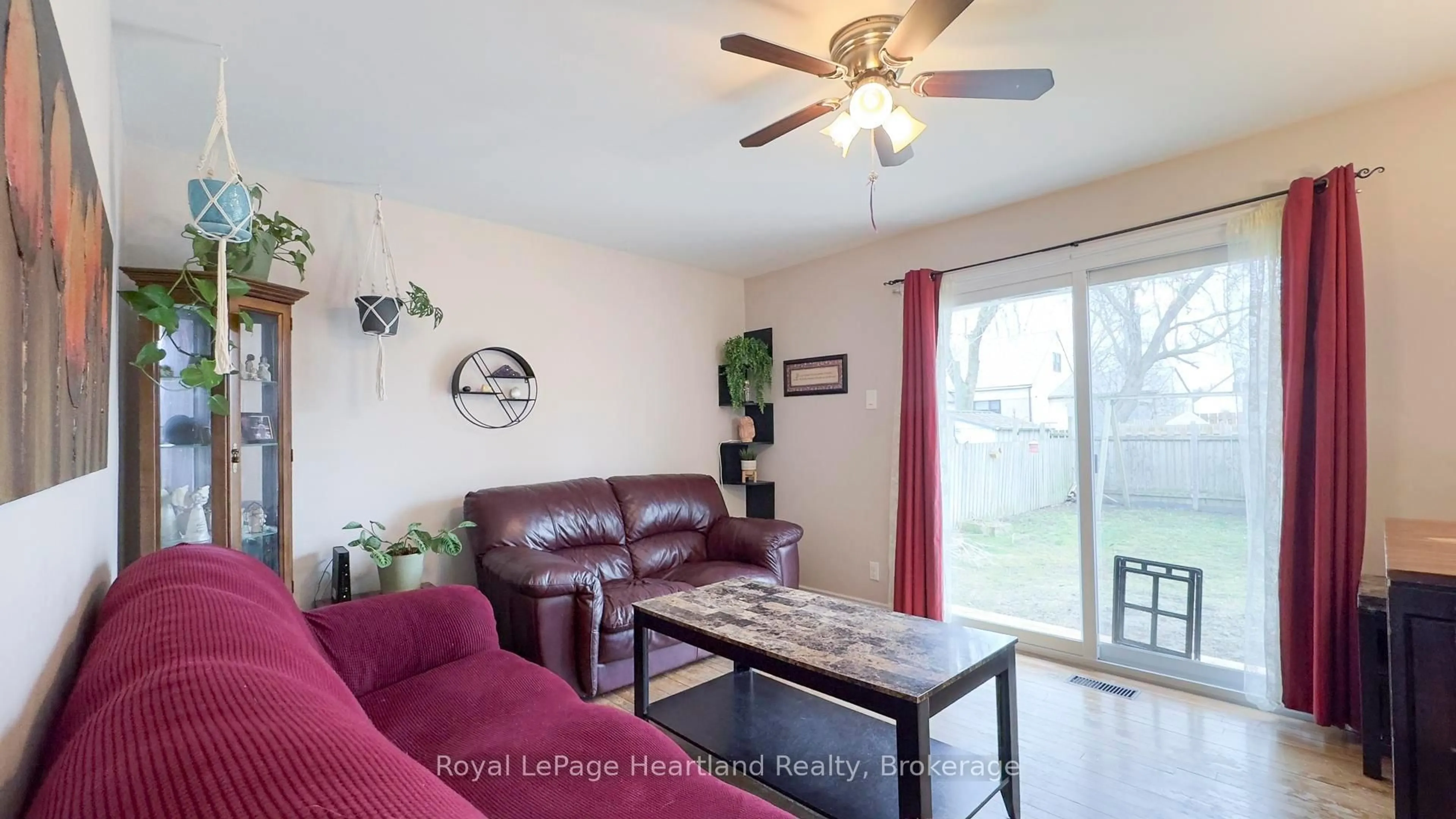 Living room with furniture, wood/laminate floor for 30 Quebec Rd, Huron East Ontario N0M 1L0