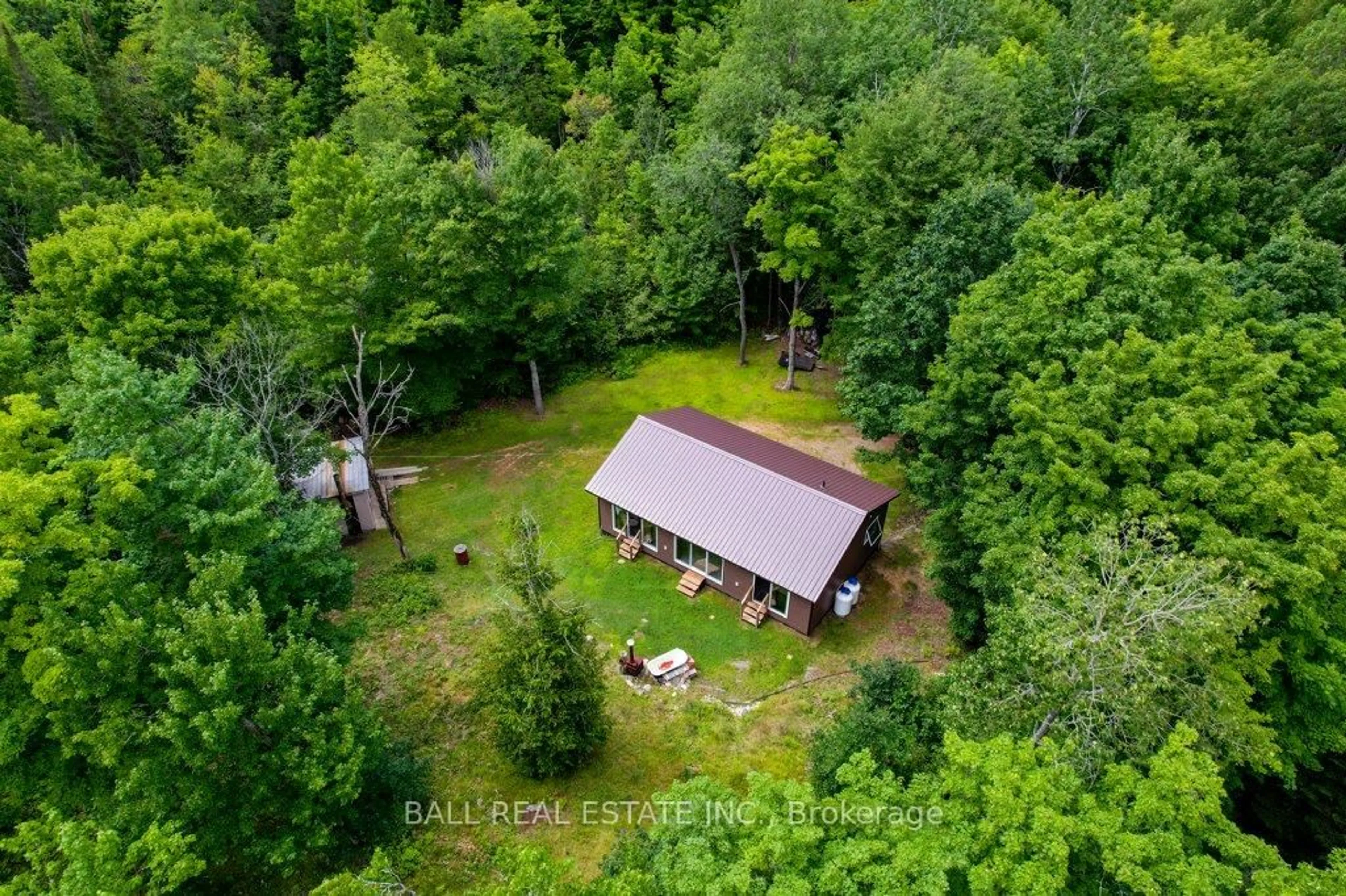 A pic from outside/outdoor area/front of a property/back of a property/a pic from drone, forest/trees view for 1794 Hadlington Rd, Highlands East Ontario K0L 2Y0