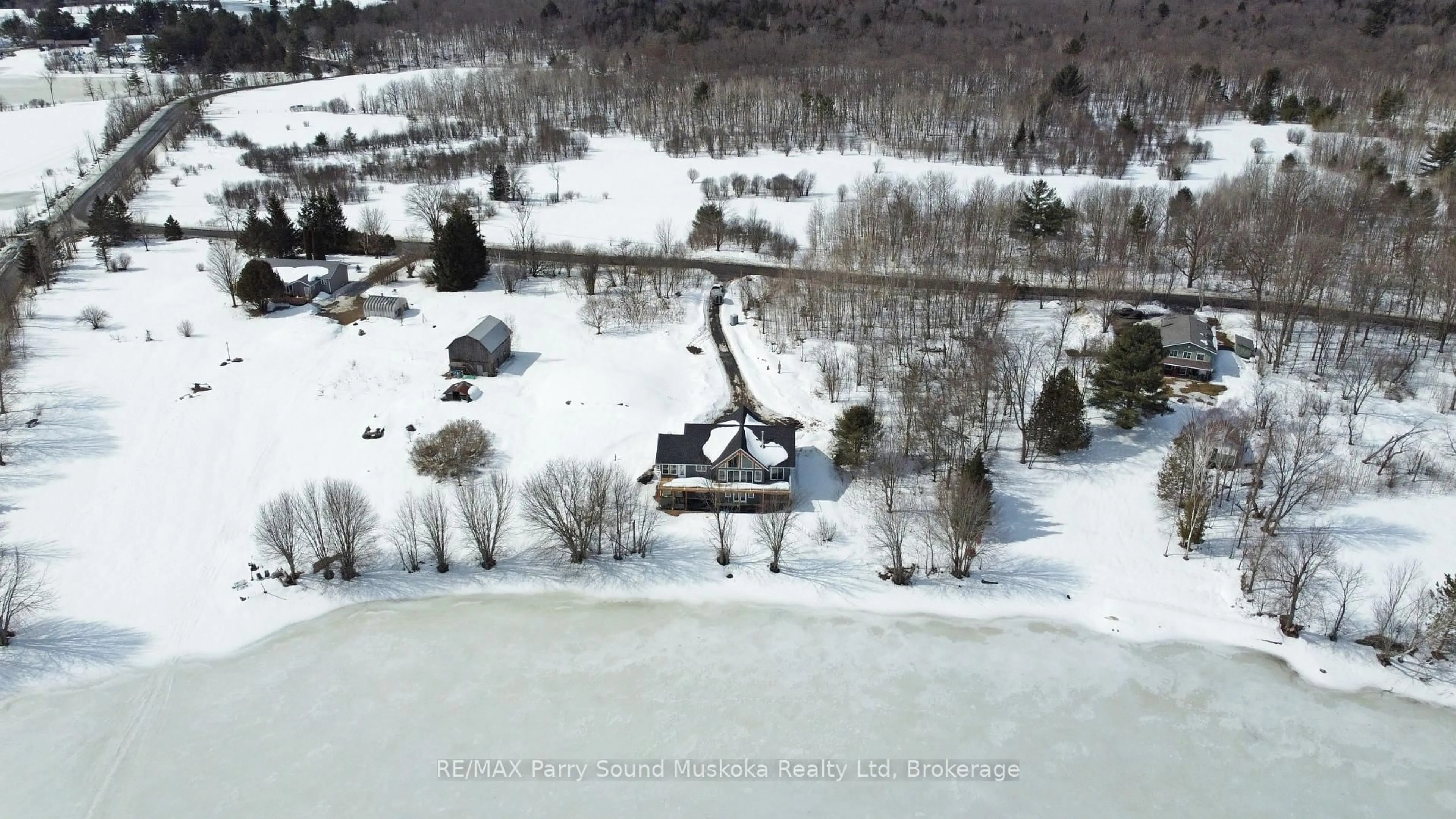 A pic from outside/outdoor area/front of a property/back of a property/a pic from drone, water/lake/river/ocean view for 49 Hardies Rd, McKellar Ontario P2A 0B5