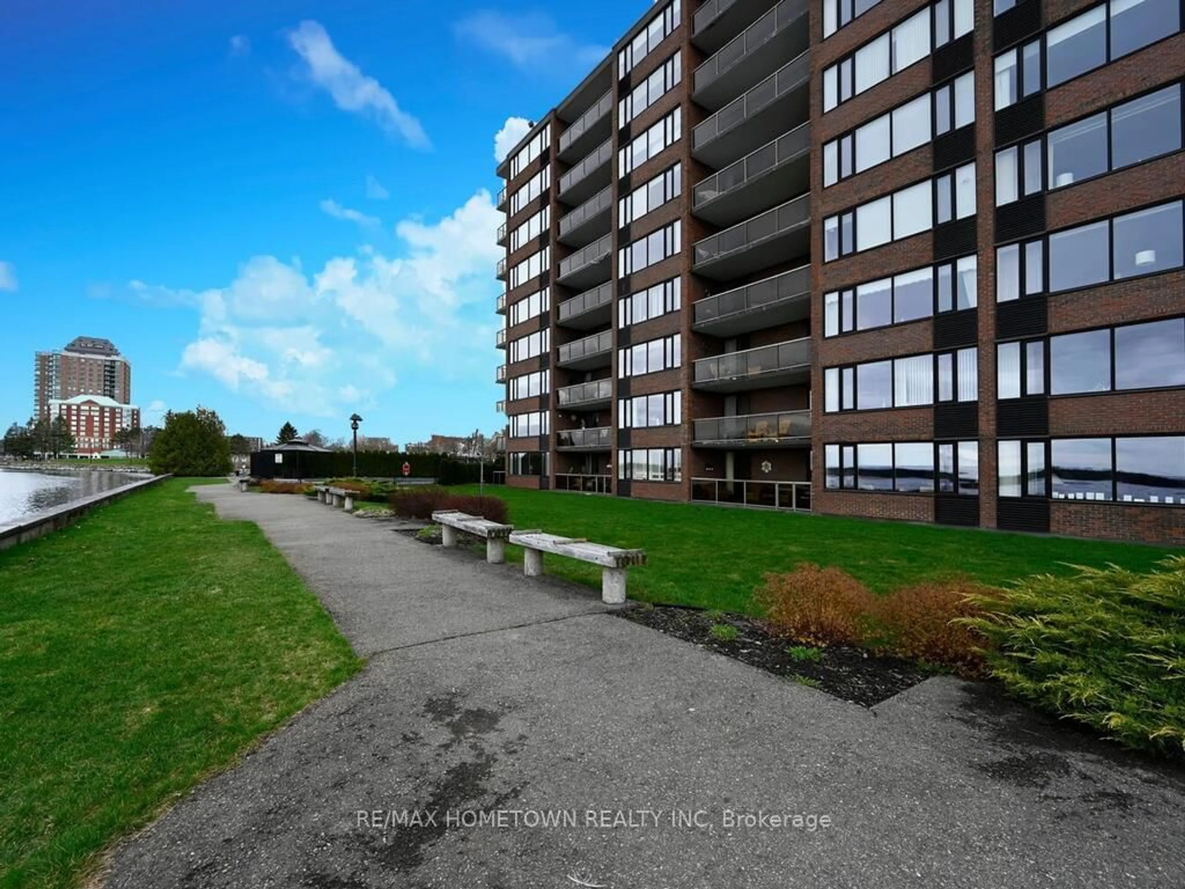 A pic from outside/outdoor area/front of a property/back of a property/a pic from drone, water/lake/river/ocean view for 55 Water St #211, Brockville Ontario K6V 1A3