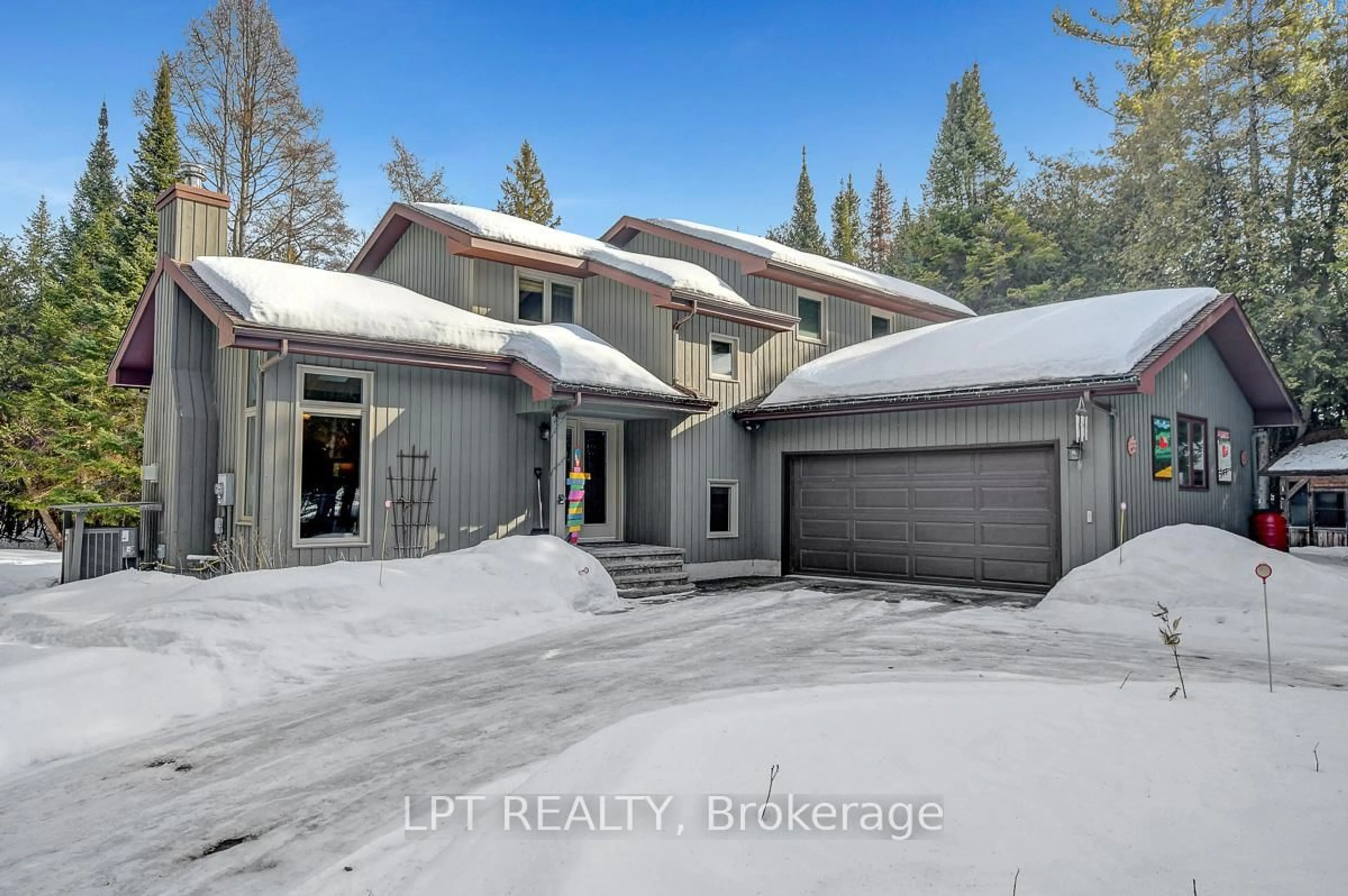 A pic from outside/outdoor area/front of a property/back of a property/a pic from drone, street for 217 Deerwood Dr, Kinburn Ontario K0A 2H0