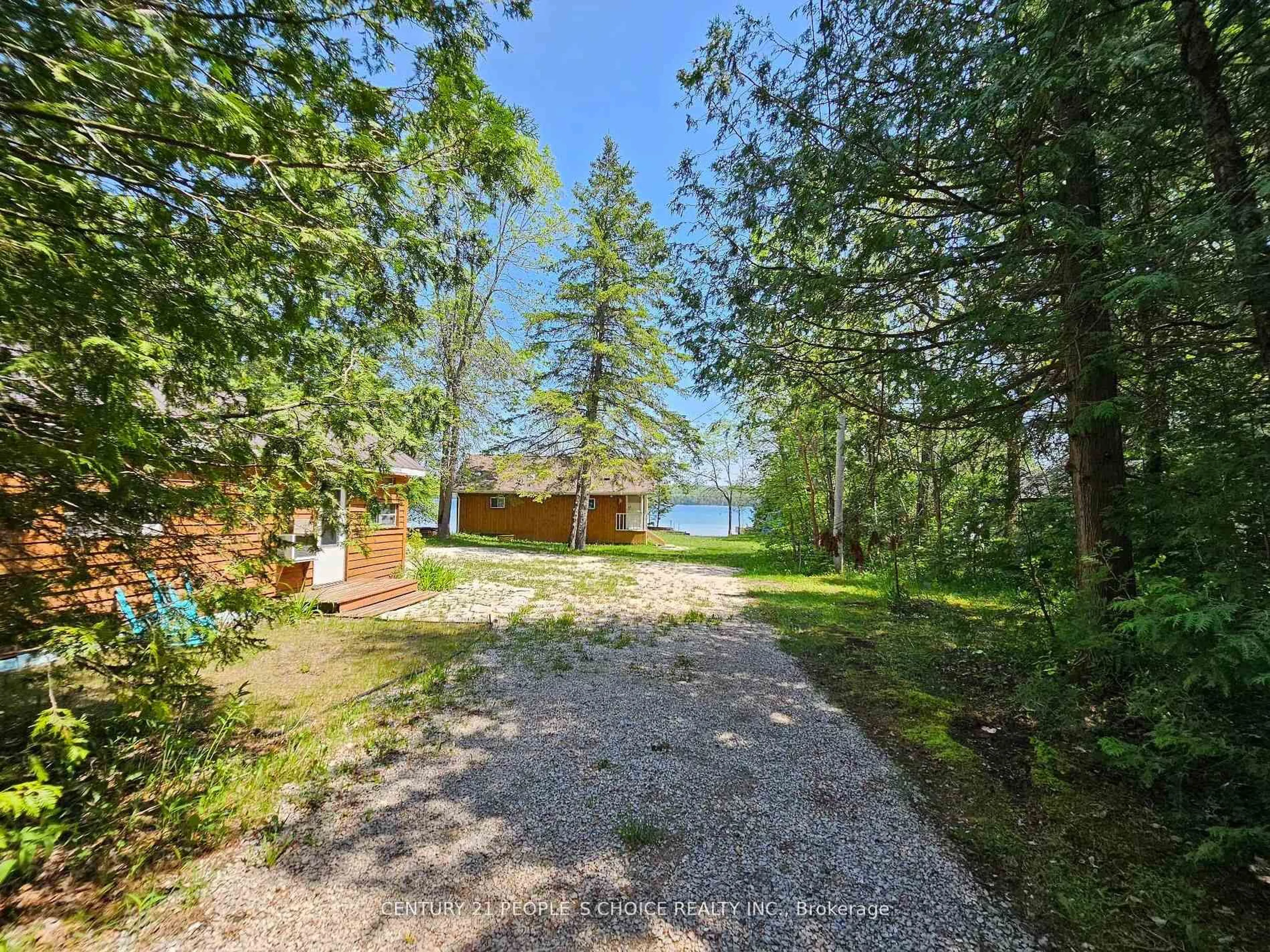 A pic from outside/outdoor area/front of a property/back of a property/a pic from drone, water/lake/river/ocean view for 123 Waterview Lane, Assiginack Ontario P0P 1N0