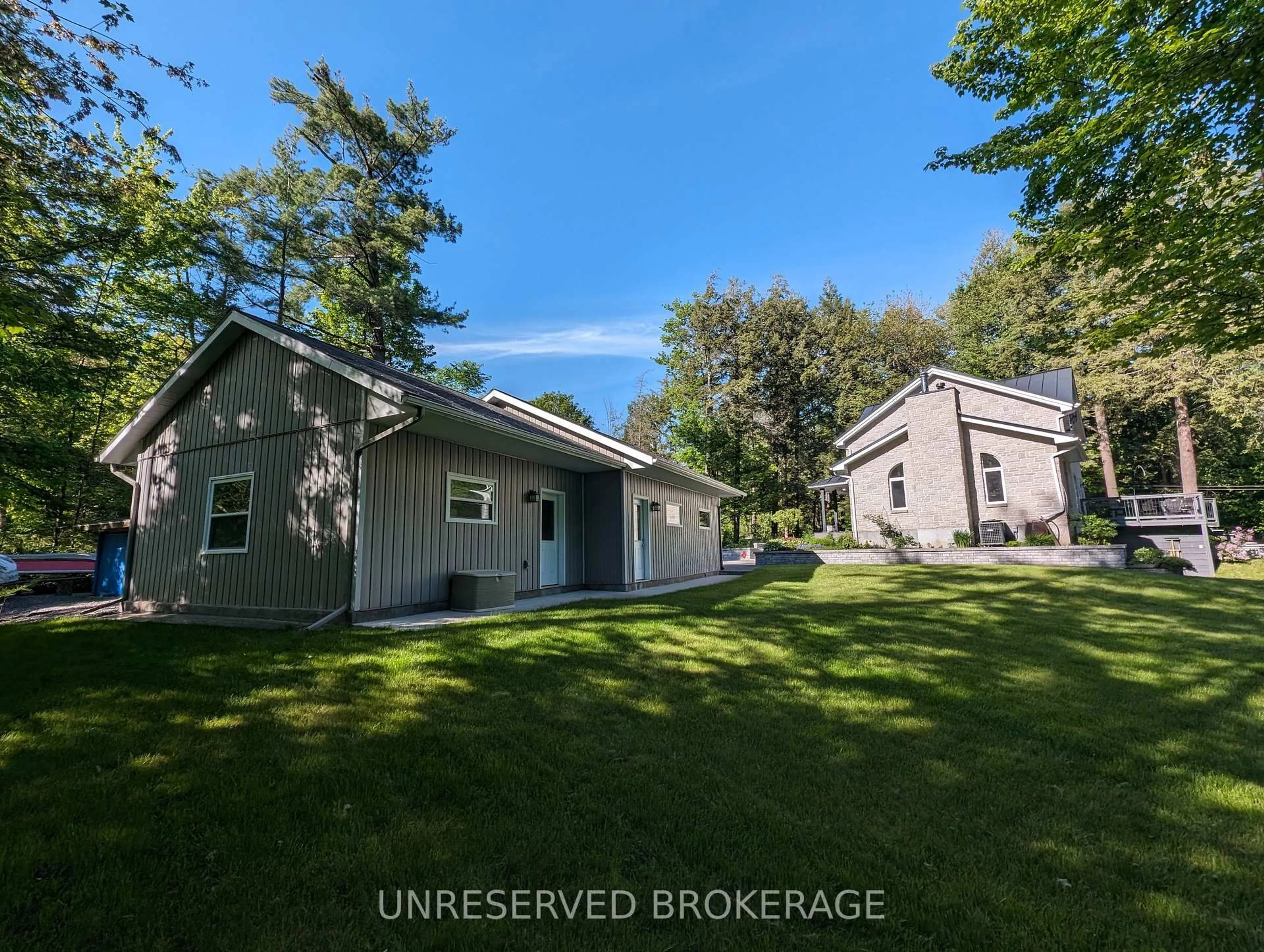 A pic from outside/outdoor area/front of a property/back of a property/a pic from drone, unknown for 1068 Buckhams Bay Rd, Ottawa Ontario K0A 3M0