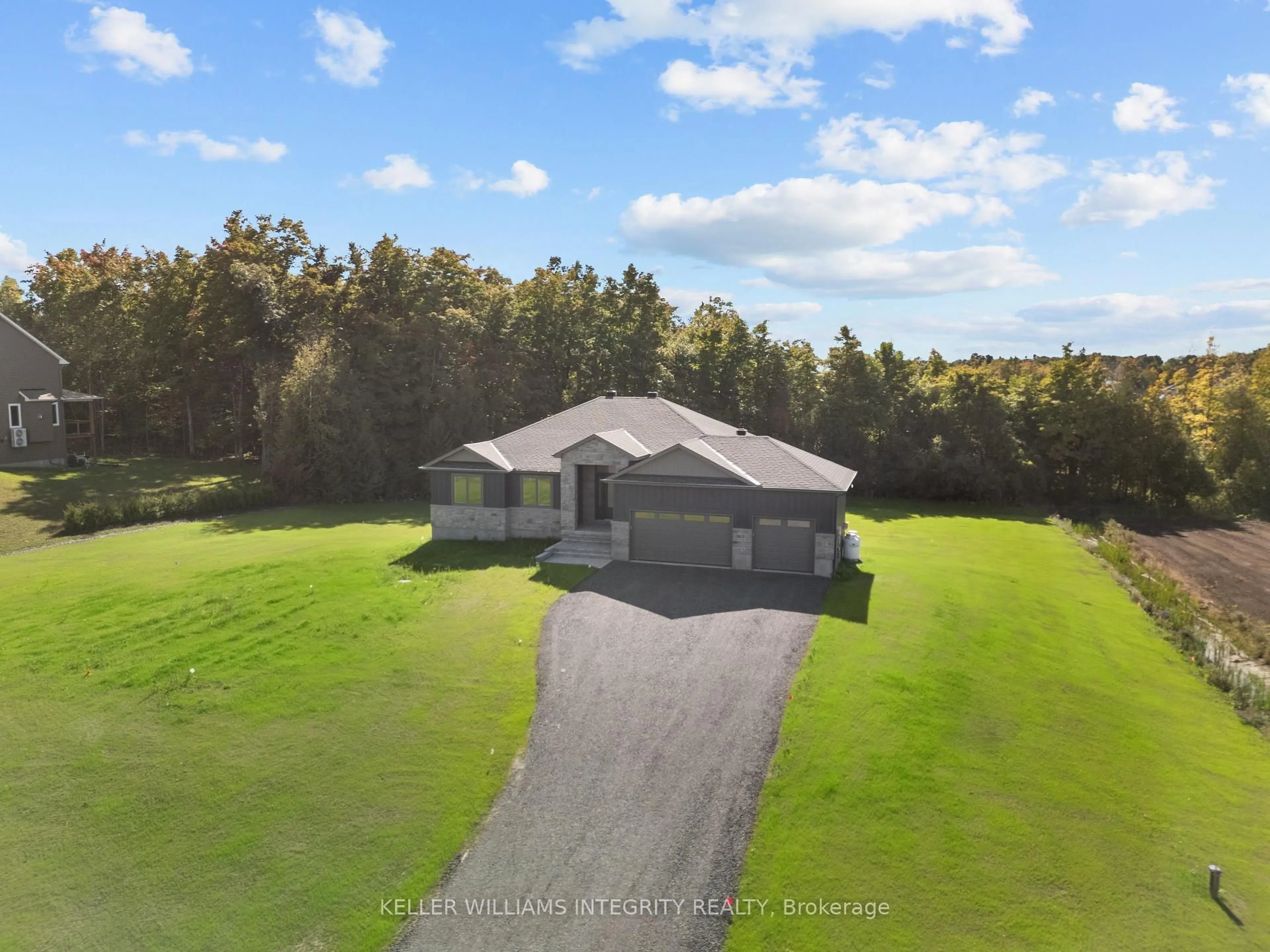 A pic from outside/outdoor area/front of a property/back of a property/a pic from drone, water/lake/river/ocean view for 312 McEwens Mill Dr, Carleton Place Ontario K7C 0C4