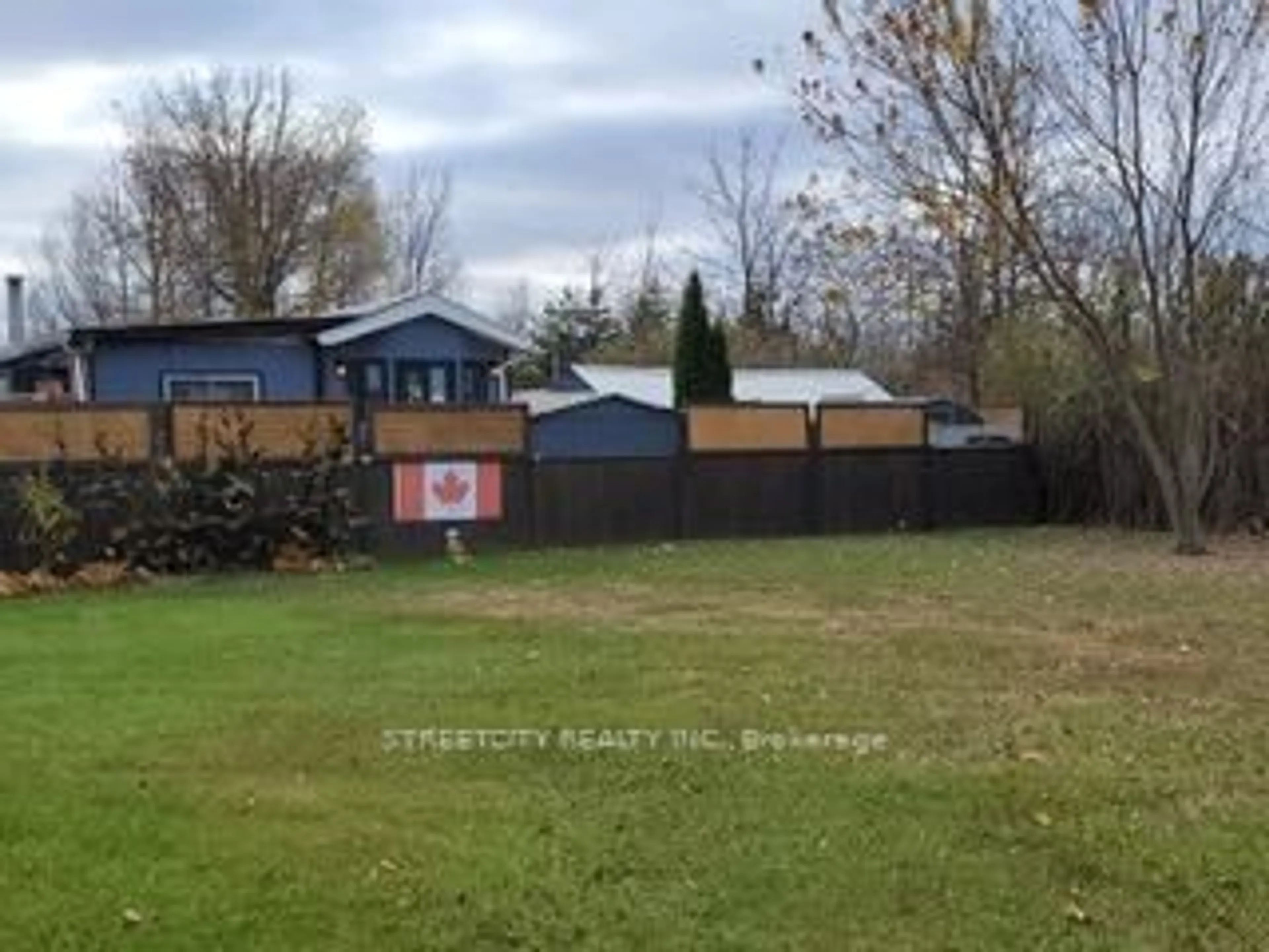 A pic from outside/outdoor area/front of a property/back of a property/a pic from drone, street for 4351 London Line #3, Plympton-Wyoming Ontario N0N 1T0