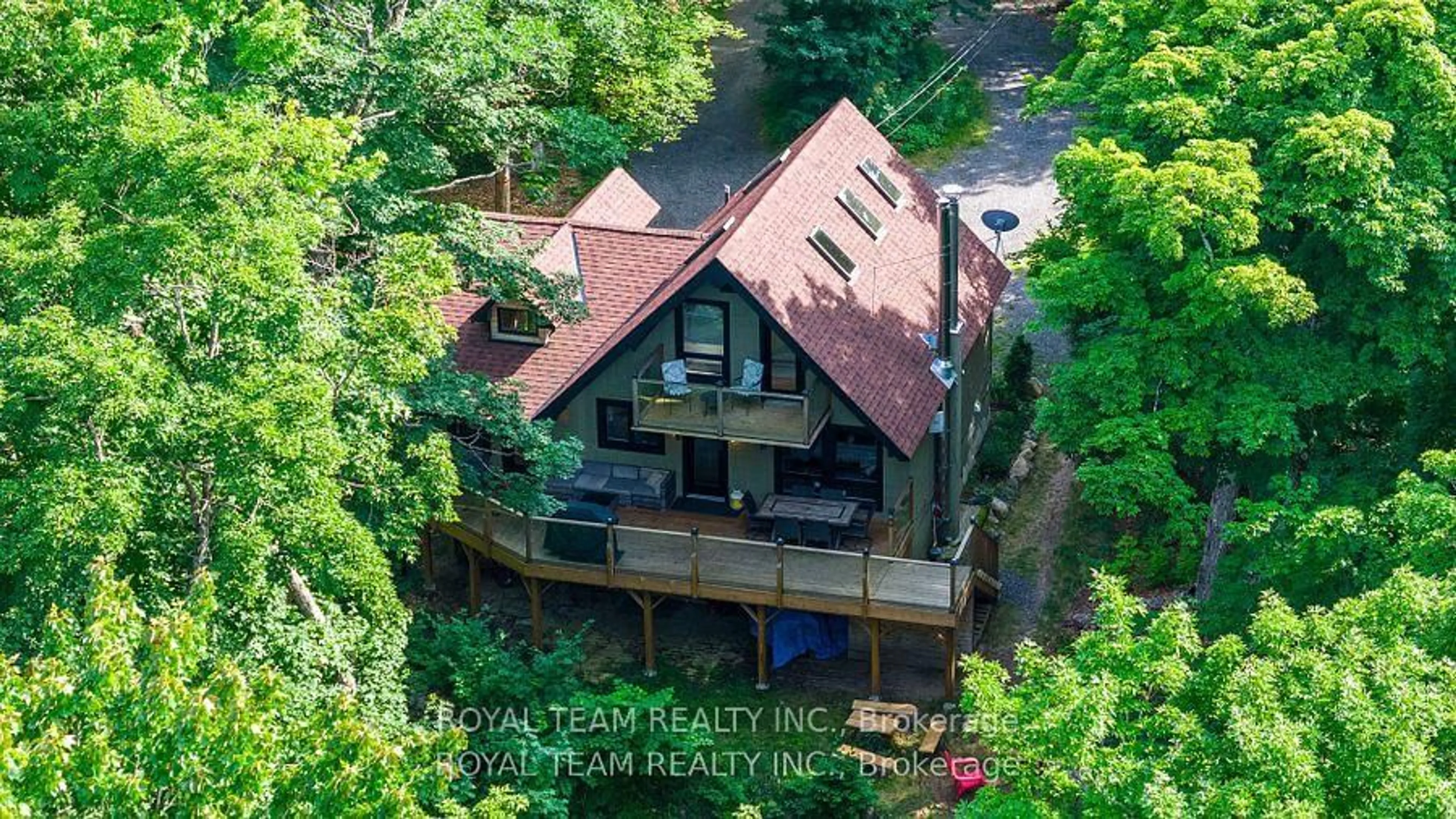 A pic from outside/outdoor area/front of a property/back of a property/a pic from drone, water/lake/river/ocean view for 12 Hayhoe Rd, Seguin Ontario P0C 1H0