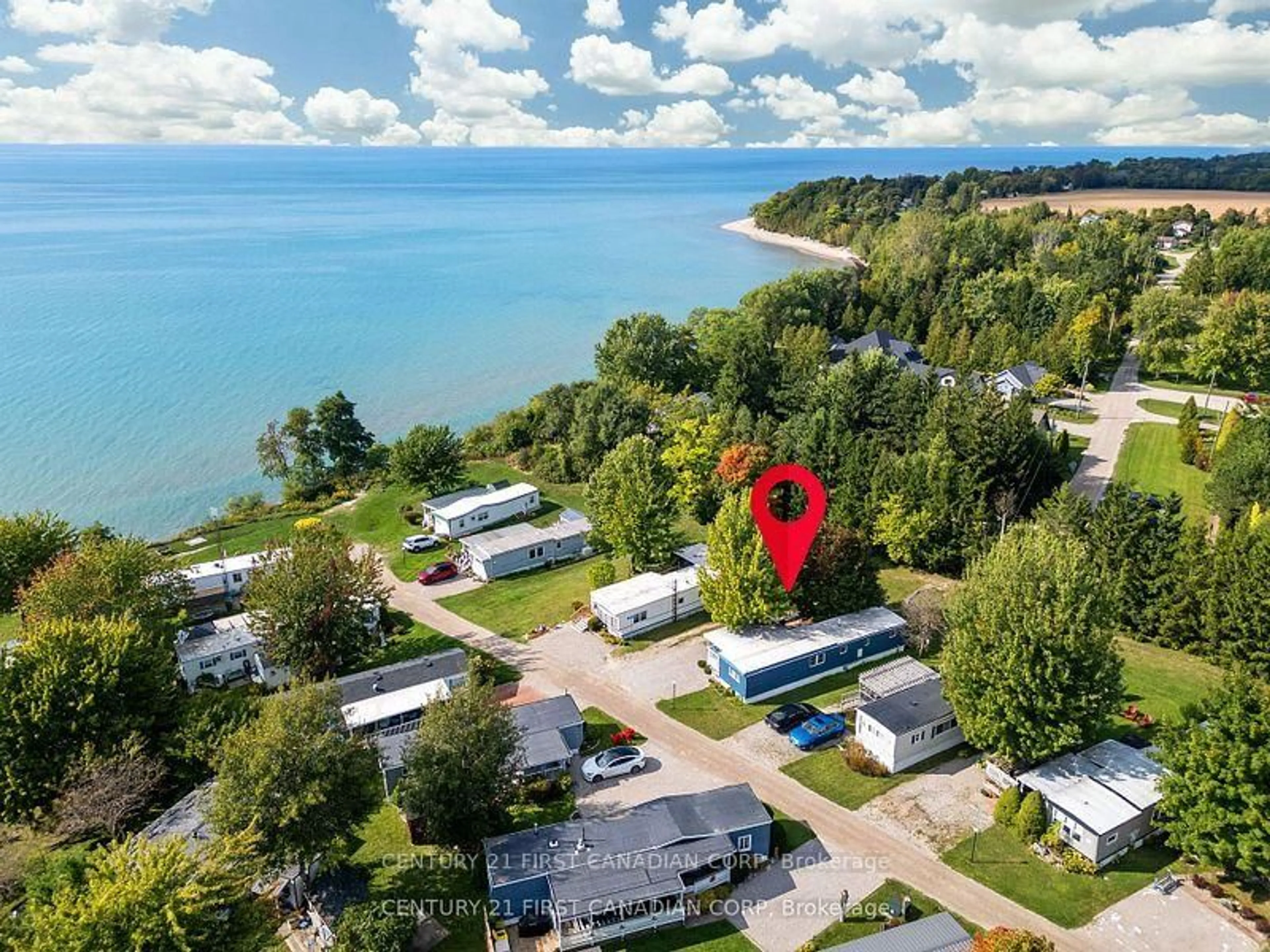 A pic from outside/outdoor area/front of a property/back of a property/a pic from drone, water/lake/river/ocean view for 48 Starlit Lane, Bluewater Ontario N0M 2T0