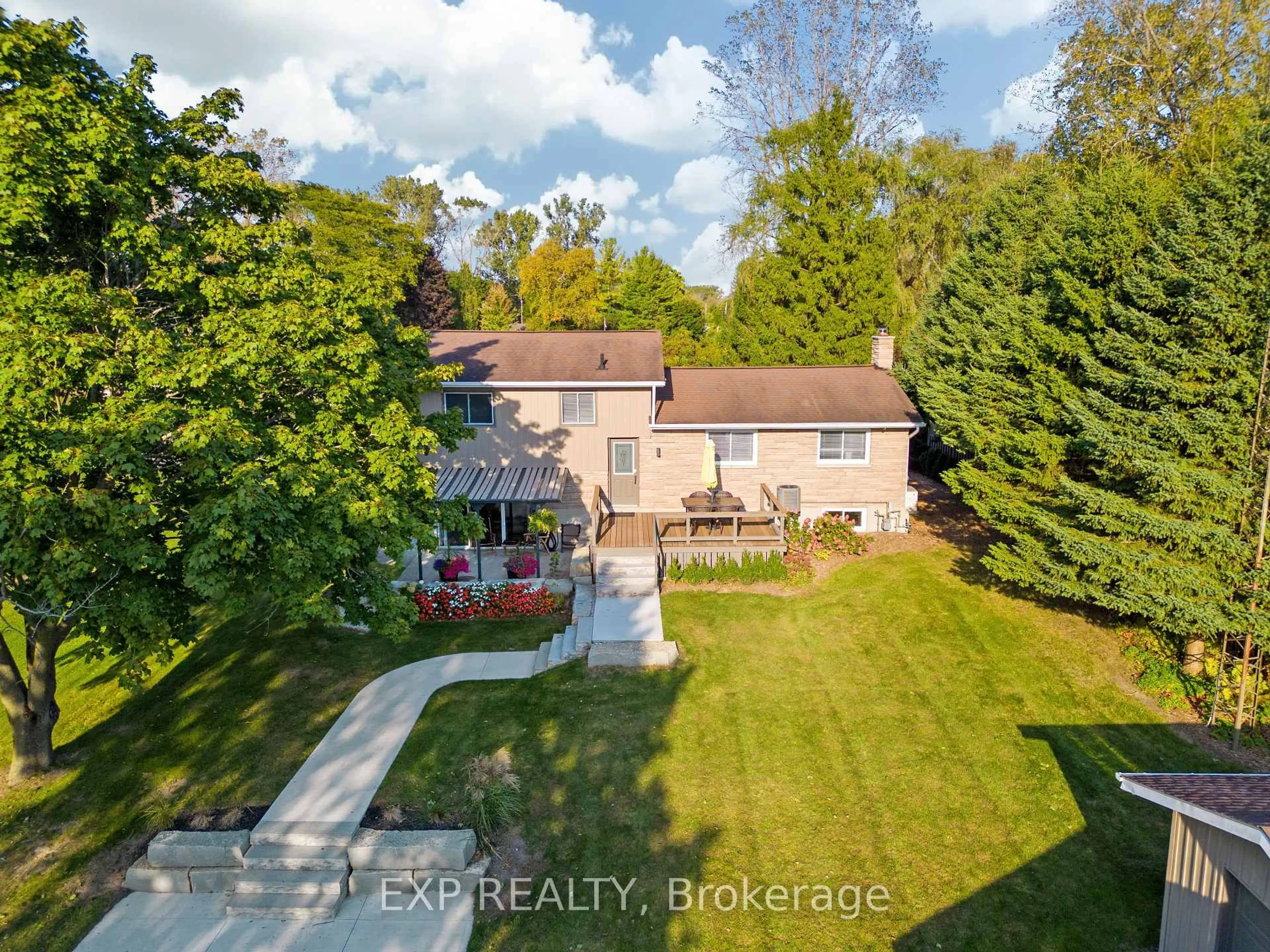 A pic from outside/outdoor area/front of a property/back of a property/a pic from drone, street for 9952 Prince Philip St, Lambton Shores Ontario N0M 2N0