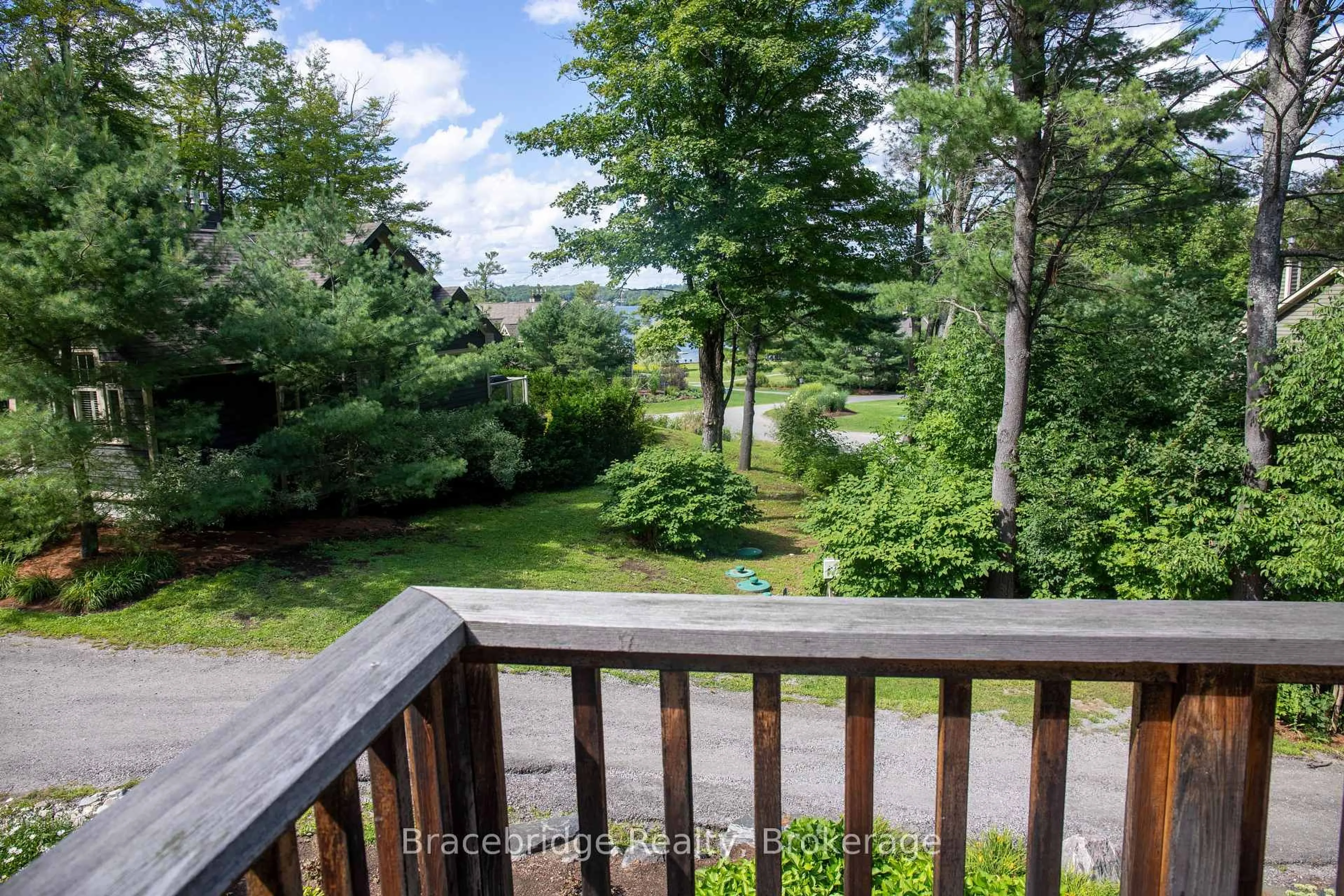 A pic from outside/outdoor area/front of a property/back of a property/a pic from drone, water/lake/river/ocean view for 3876 MUSKOKA RD HWY 118 N/A #Sandfield 9 W9, Muskoka Lakes Ontario P0B 1J0