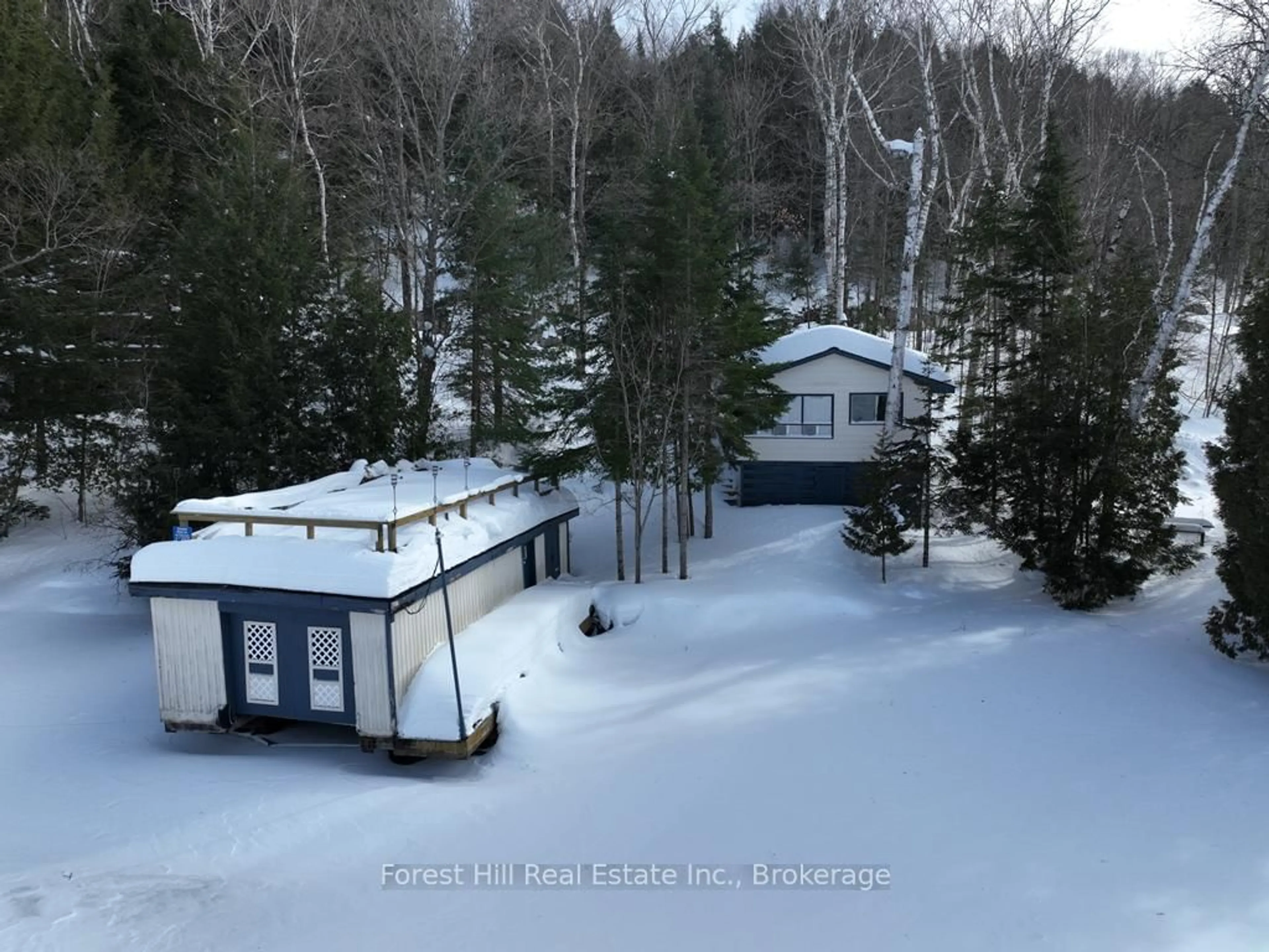 A pic from outside/outdoor area/front of a property/back of a property/a pic from drone, forest/trees view for 27509 Minden Point Tr, Algonquin Highlands Ontario P0A 1E0