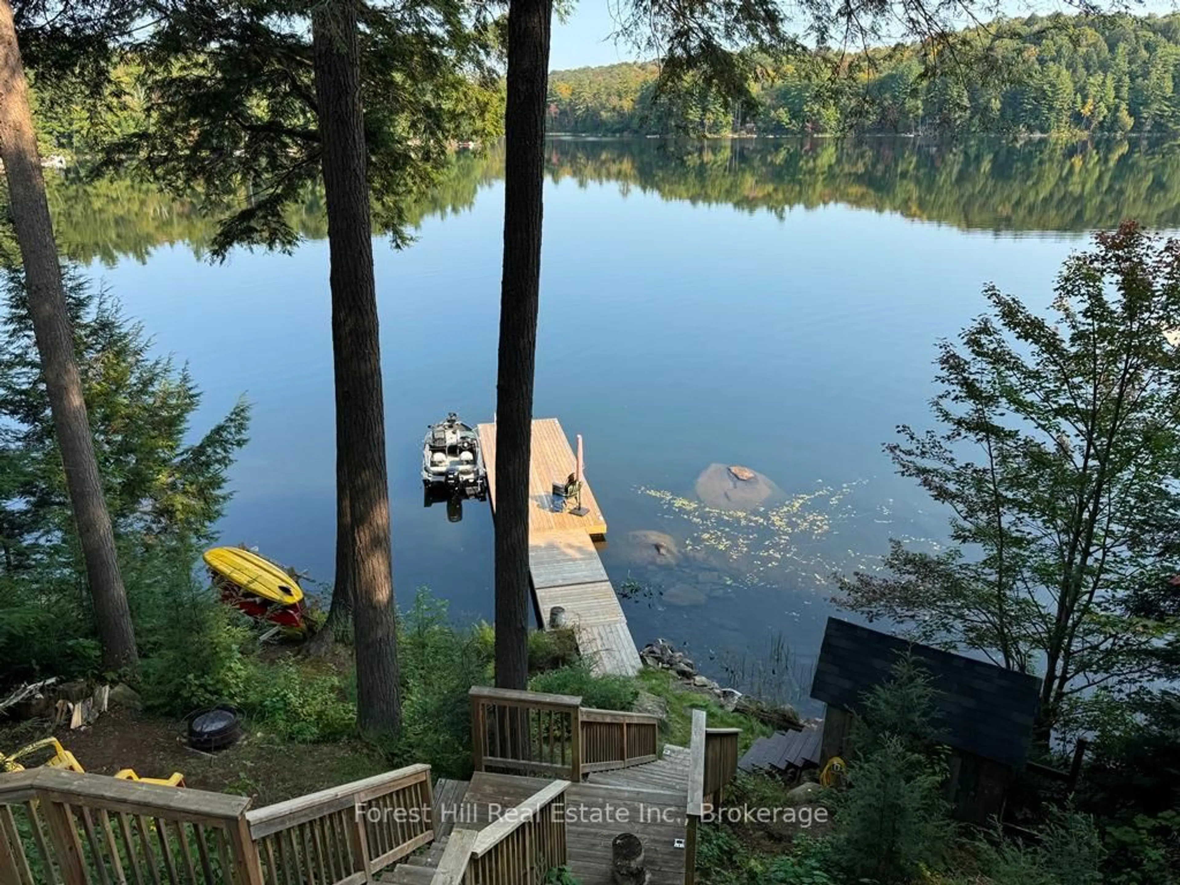 A pic from outside/outdoor area/front of a property/back of a property/a pic from drone, water/lake/river/ocean view for 1023 Twilight Close Lane, Algonquin Highlands Ontario P0A 1E0