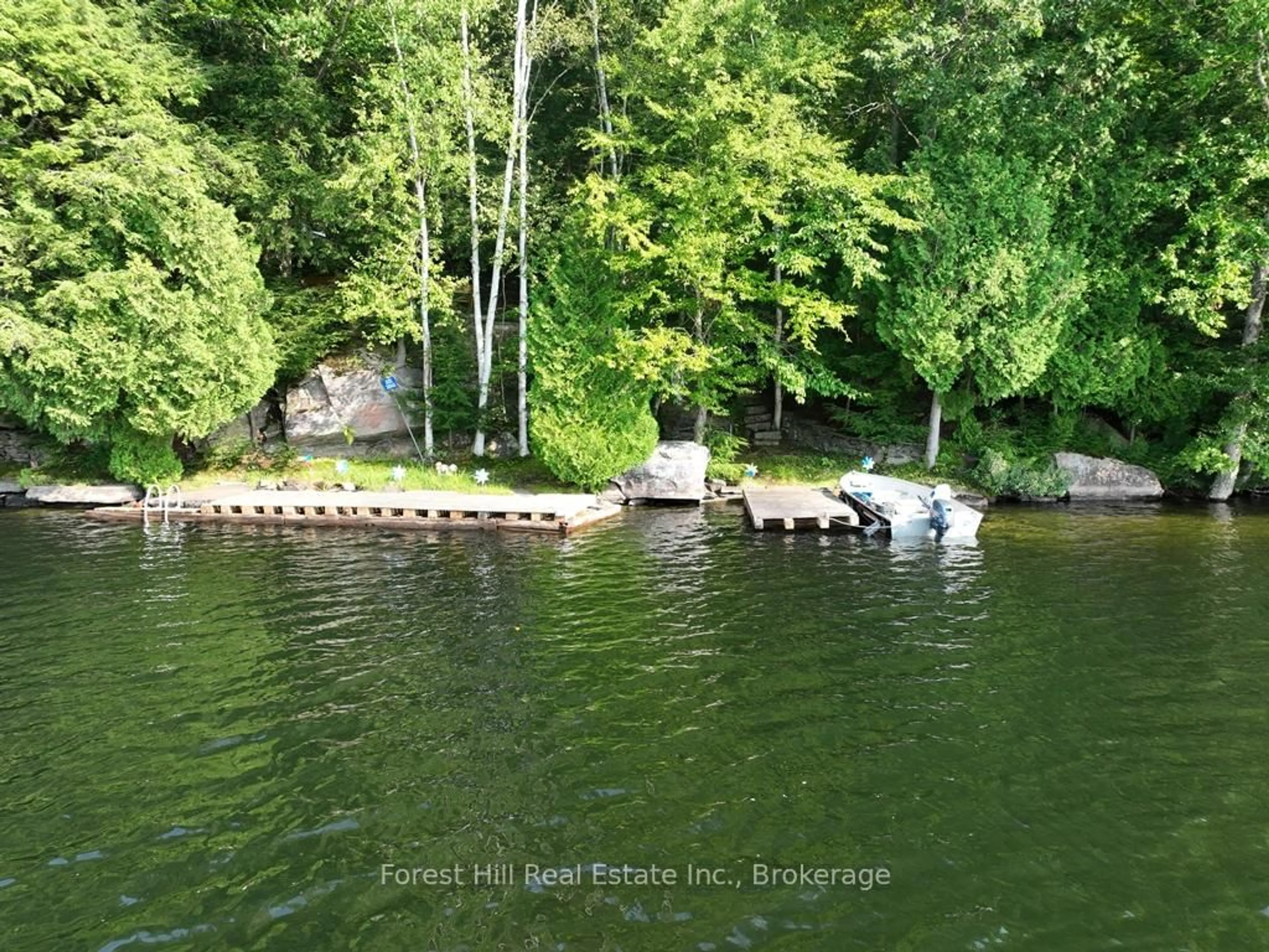 A pic from outside/outdoor area/front of a property/back of a property/a pic from drone, water/lake/river/ocean view for 30945 KAWAGAMA Lake WAO, Algonquin Highlands Ontario P0A 1E0