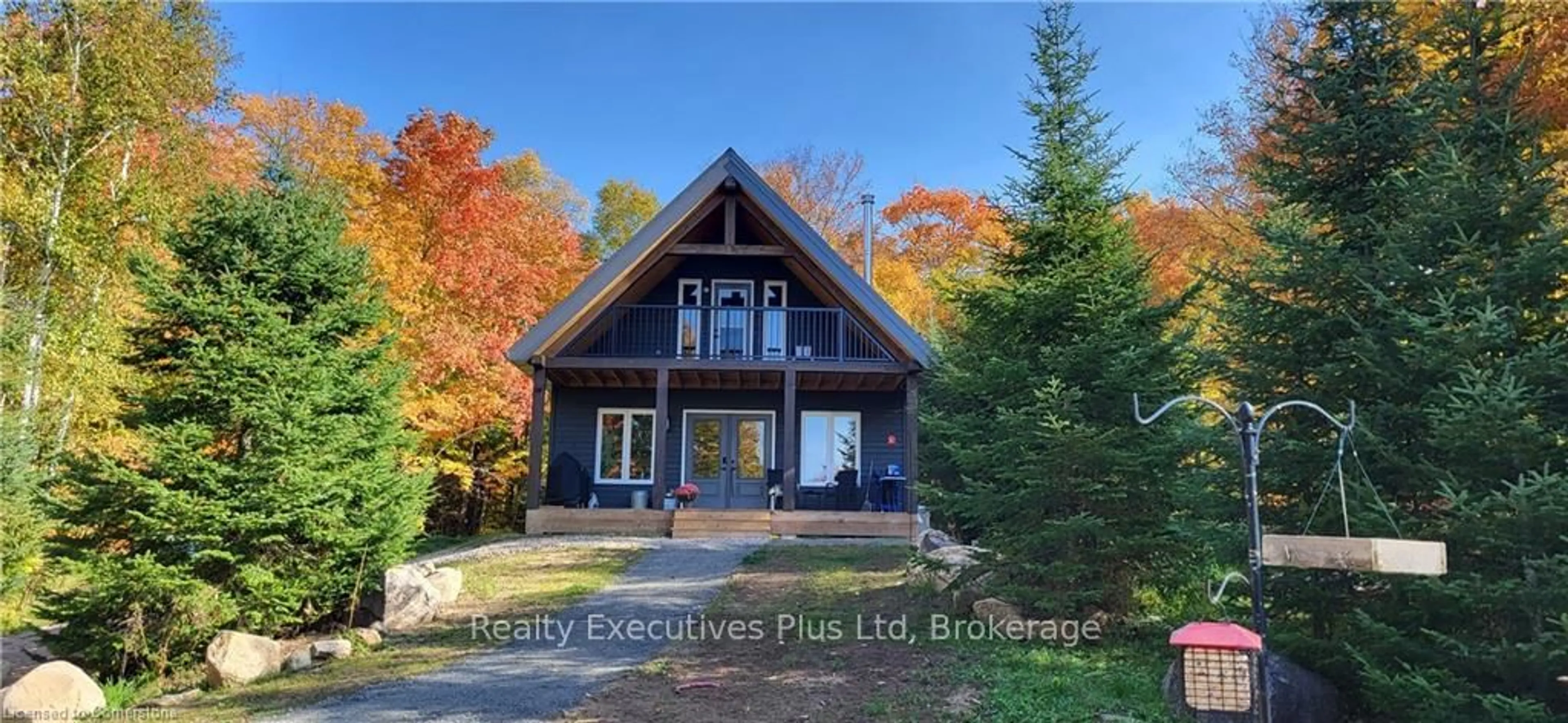 A pic from outside/outdoor area/front of a property/back of a property/a pic from drone, water/lake/river/ocean view for 1908 Eagle Lake Rd, Machar Ontario P0A 1X0