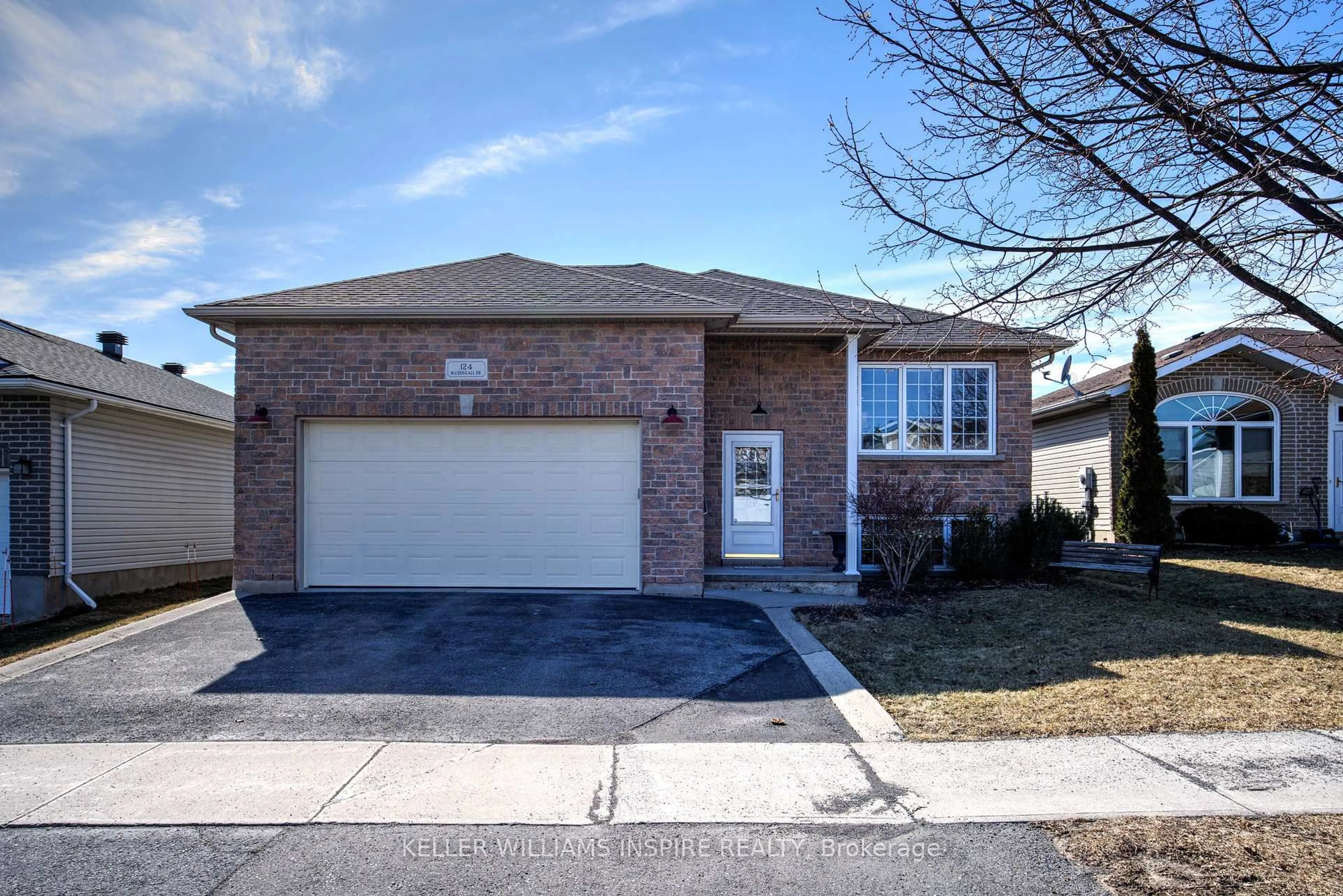 Home with brick exterior material, street for 124 Macdougall Dr, Loyalist Ontario K7N 0A2