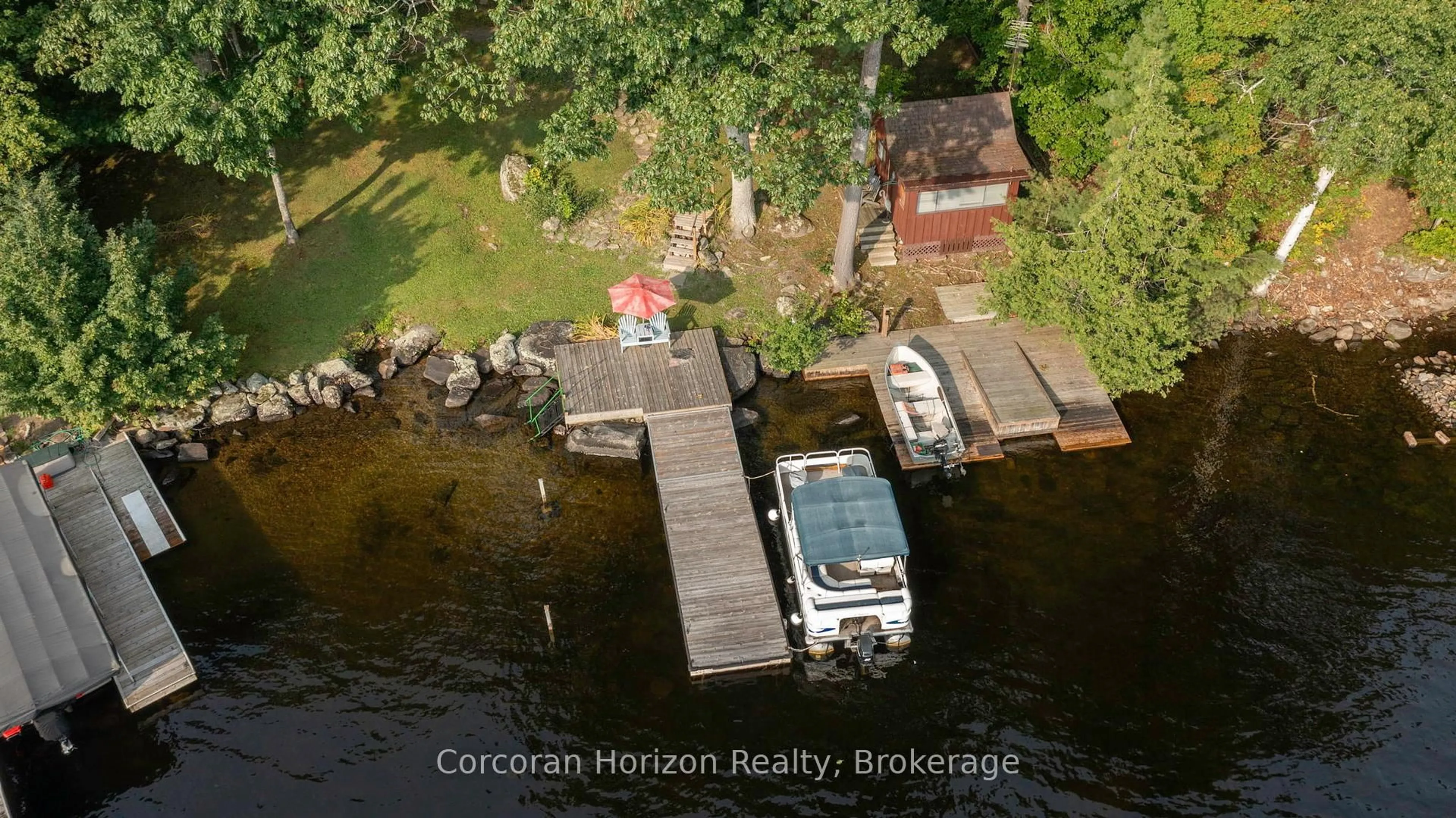 A pic from outside/outdoor area/front of a property/back of a property/a pic from drone, water/lake/river/ocean view for 1641 WALKERS POINT Rd, Muskoka Lakes Ontario P1P 1R2