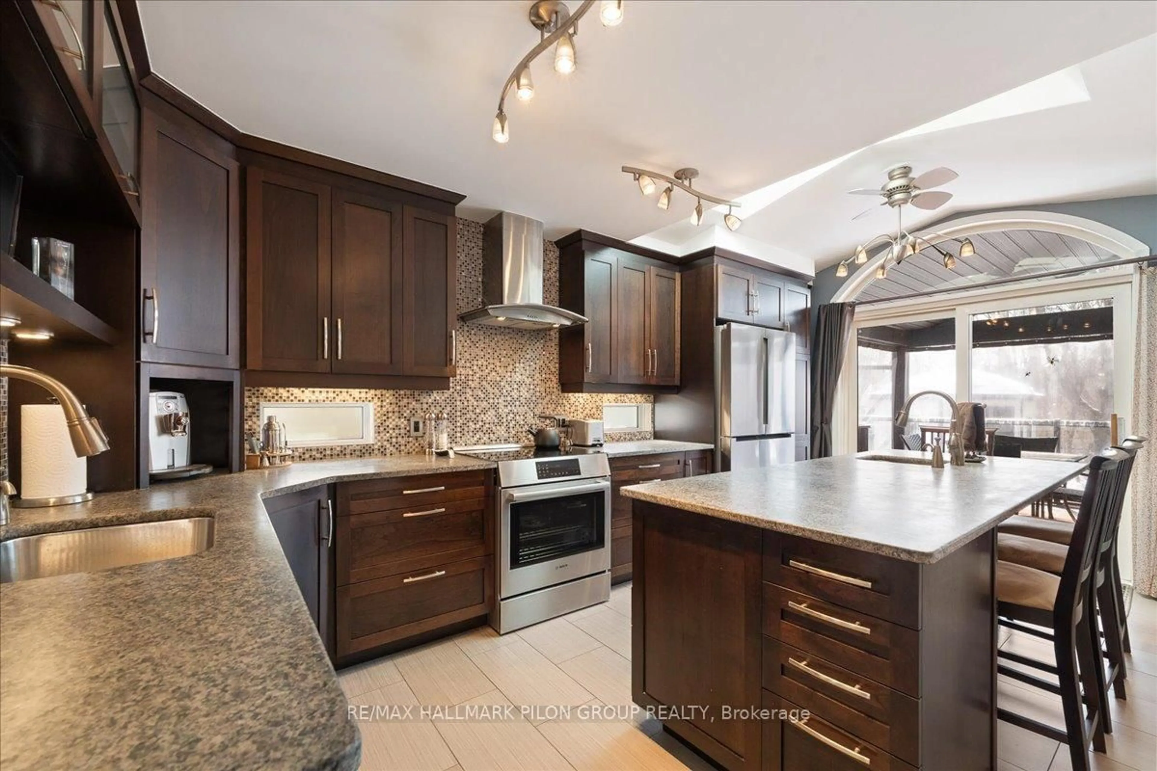 Open concept kitchen, ceramic/tile floor for 1085 Ambercrest St, Ottawa Ontario K1J 1G3