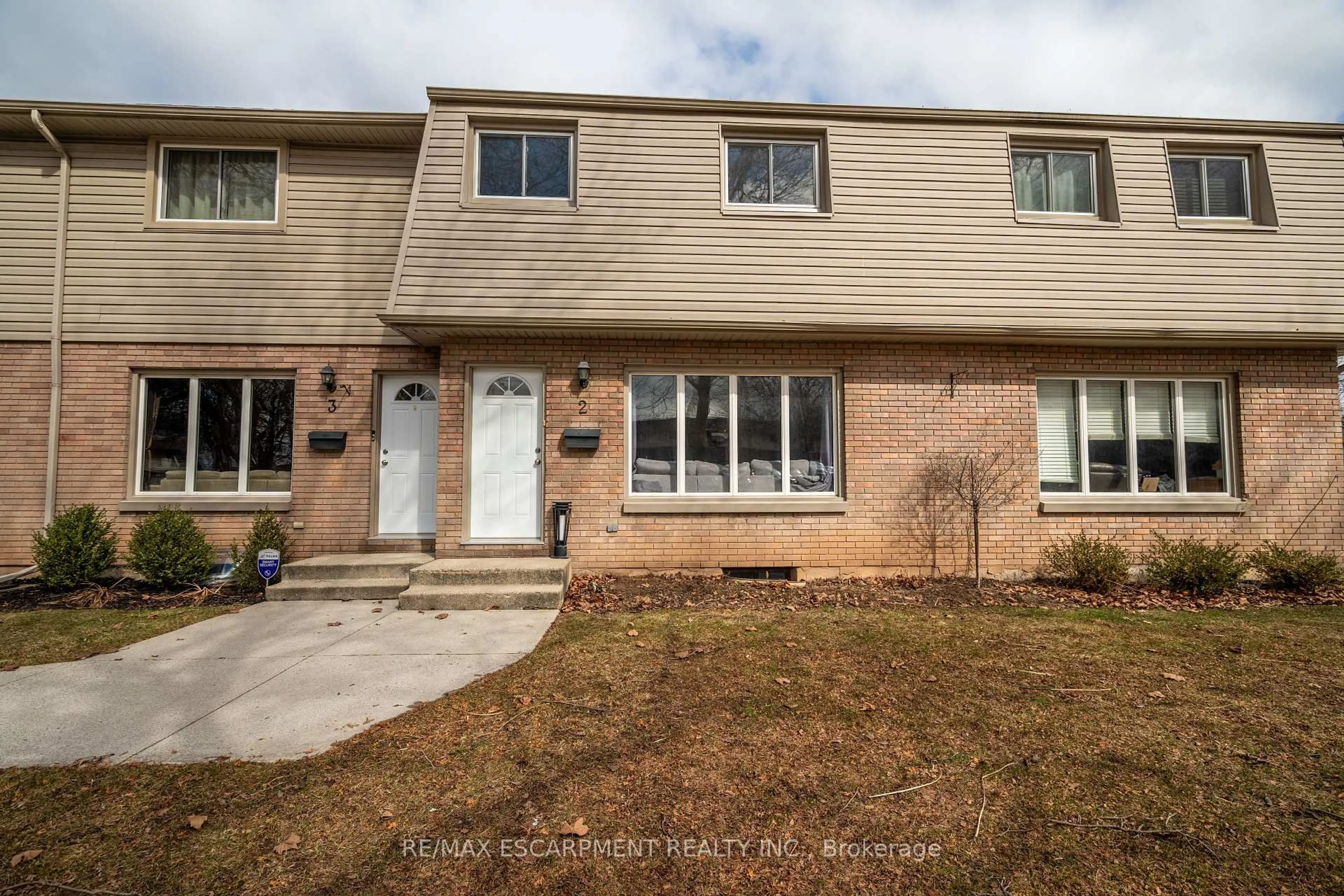 Home with brick exterior material, street for 4215 Meadowvale St #2, Niagara Falls Ontario L2E 5W8