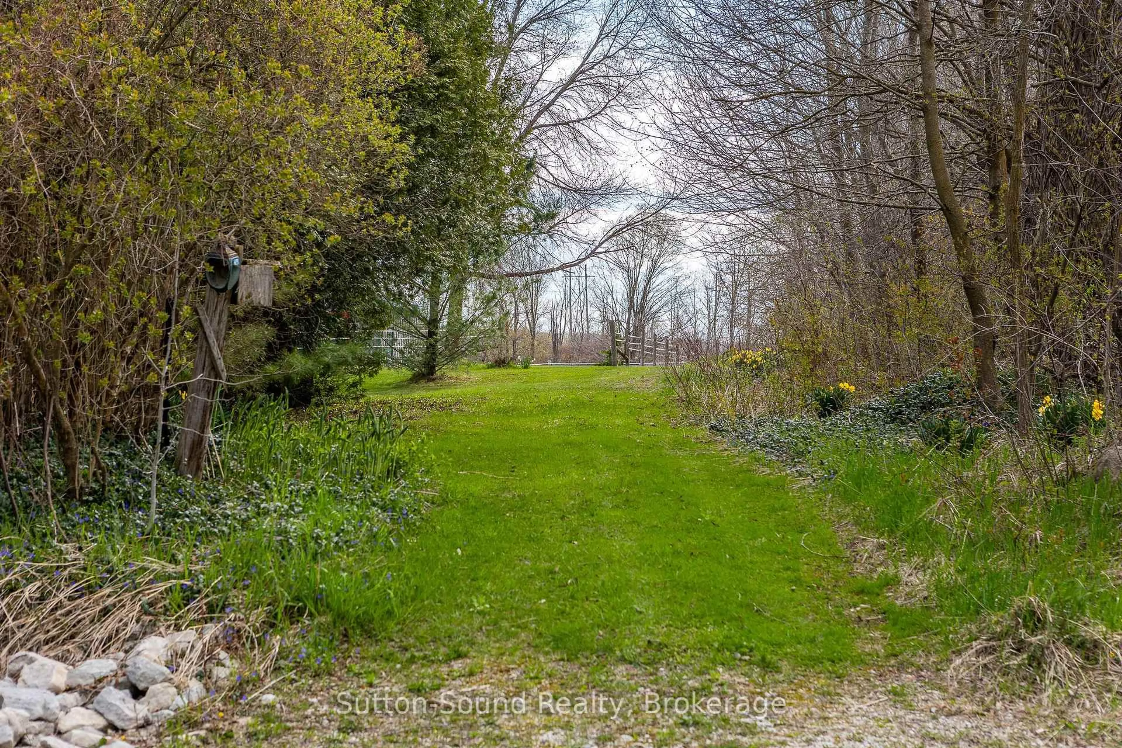 A pic from outside/outdoor area/front of a property/back of a property/a pic from drone, forest/trees view for 338179 11 Concession, Meaford Ontario N4K 5N8