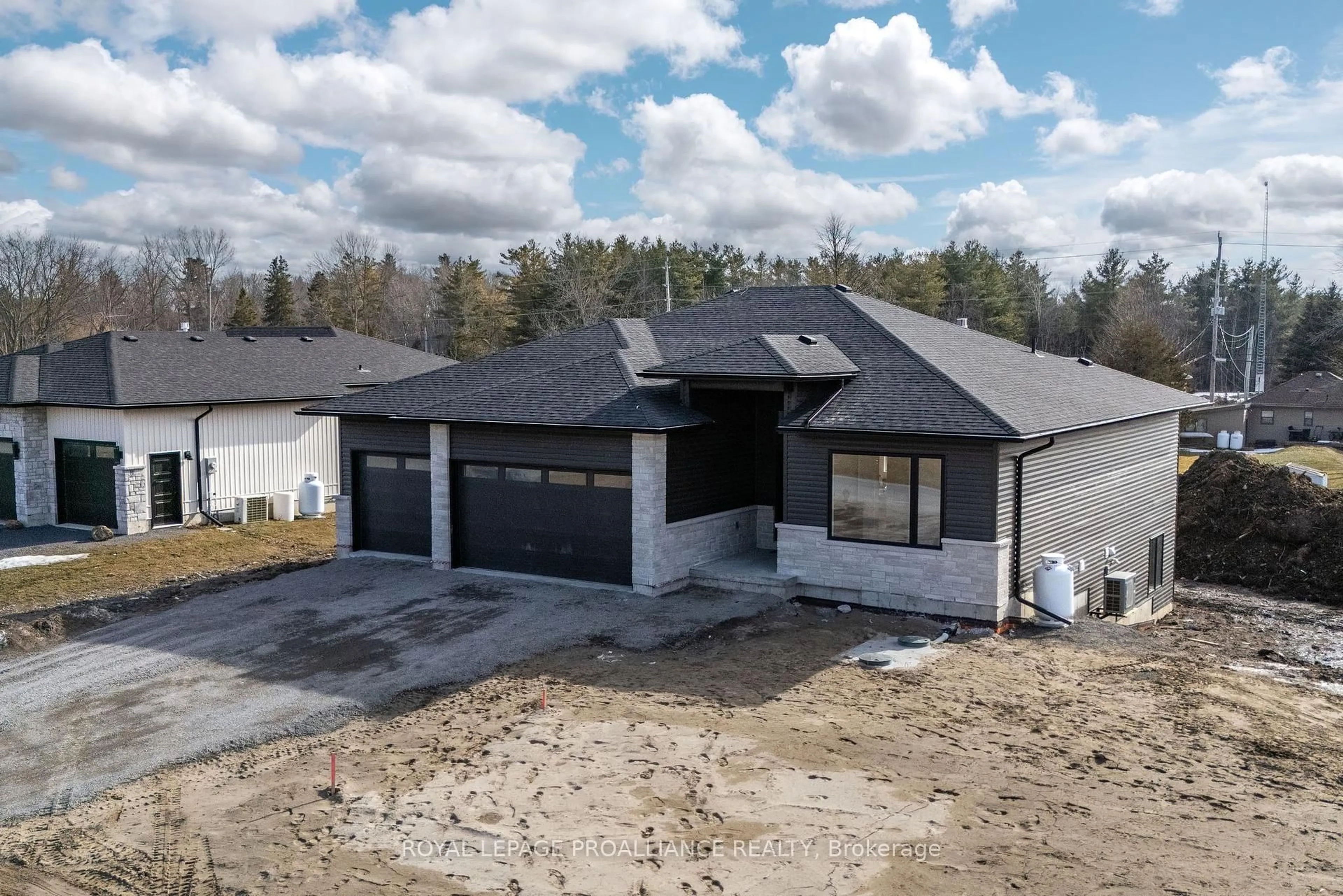 A pic from outside/outdoor area/front of a property/back of a property/a pic from drone, street for 88 Michael's Way, Prince Edward County Ontario K0K 1L0