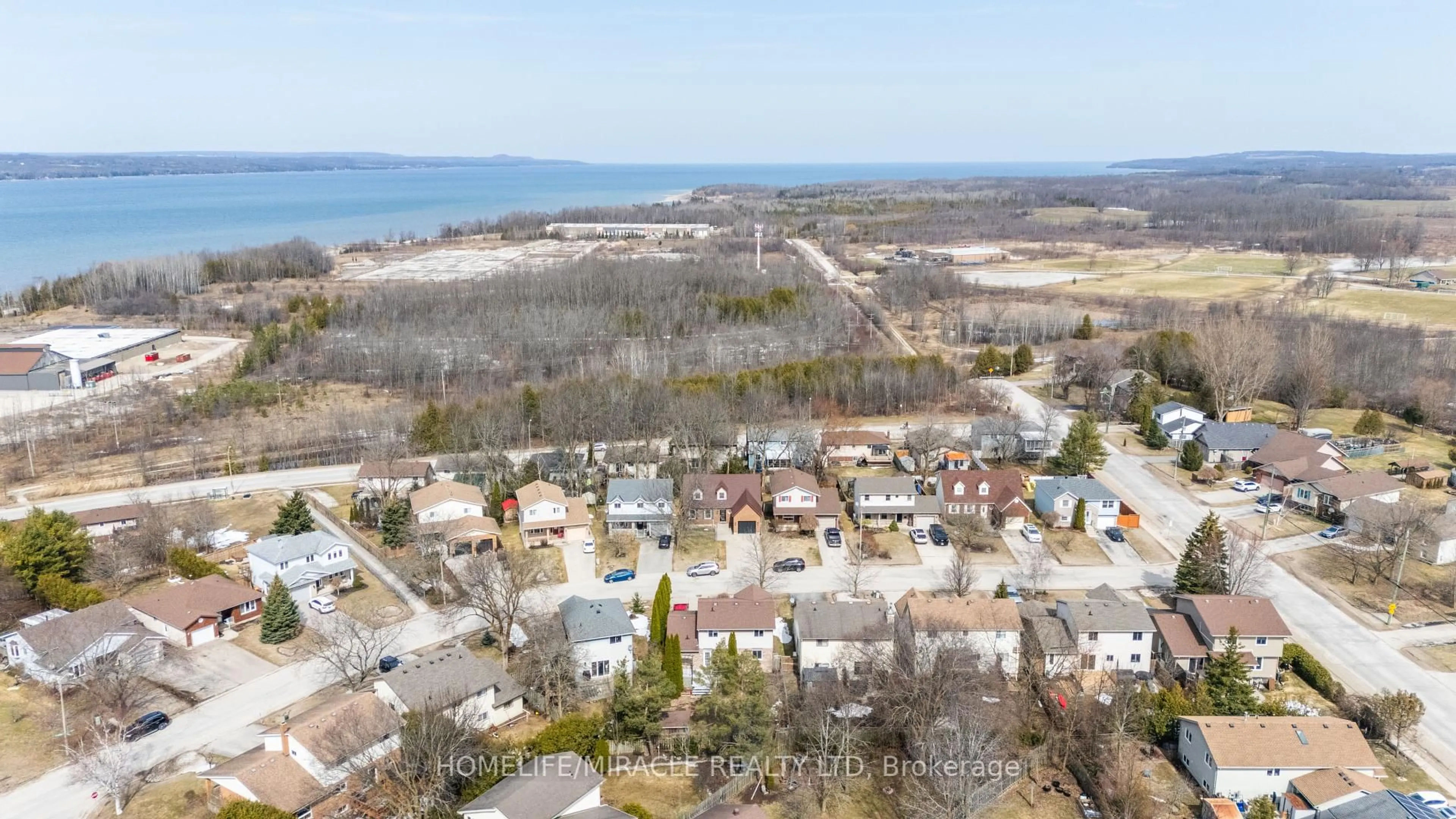 A pic from outside/outdoor area/front of a property/back of a property/a pic from drone, water/lake/river/ocean view for 880 27th St, Owen Sound Ontario N4K 6P3