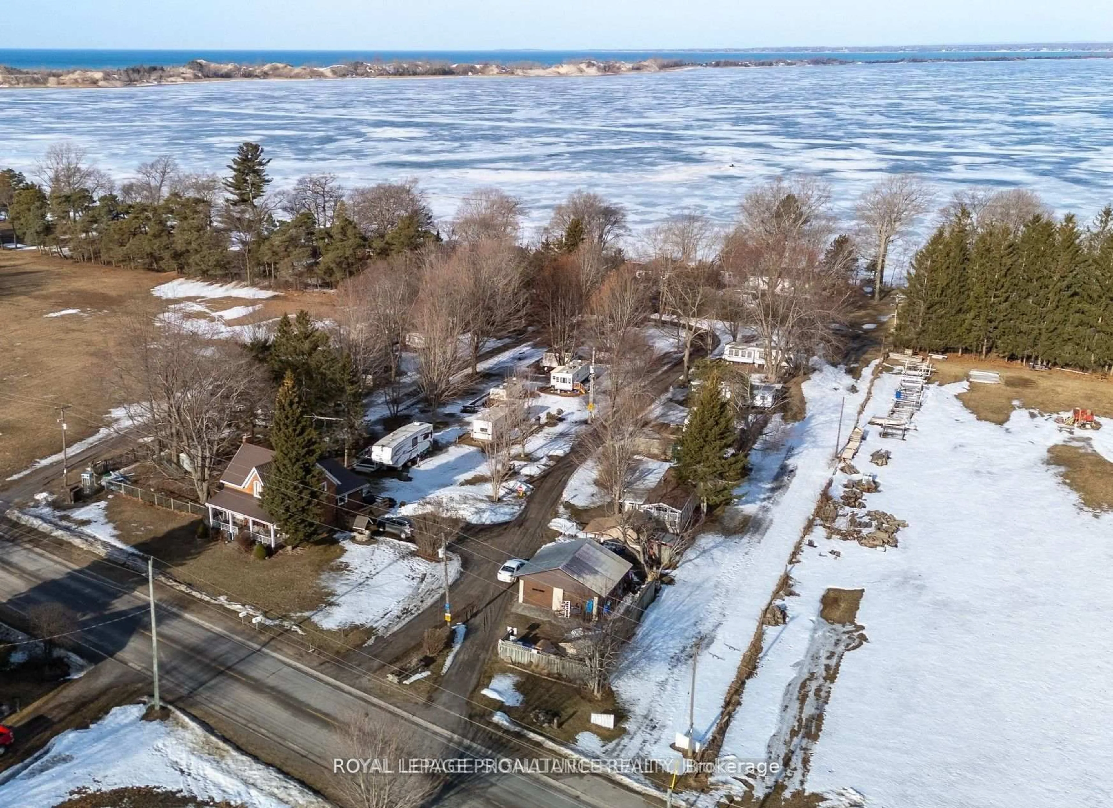 A pic from outside/outdoor area/front of a property/back of a property/a pic from drone, water/lake/river/ocean view for 1818 County 12 Rd, Prince Edward County Ontario K0K 2T0