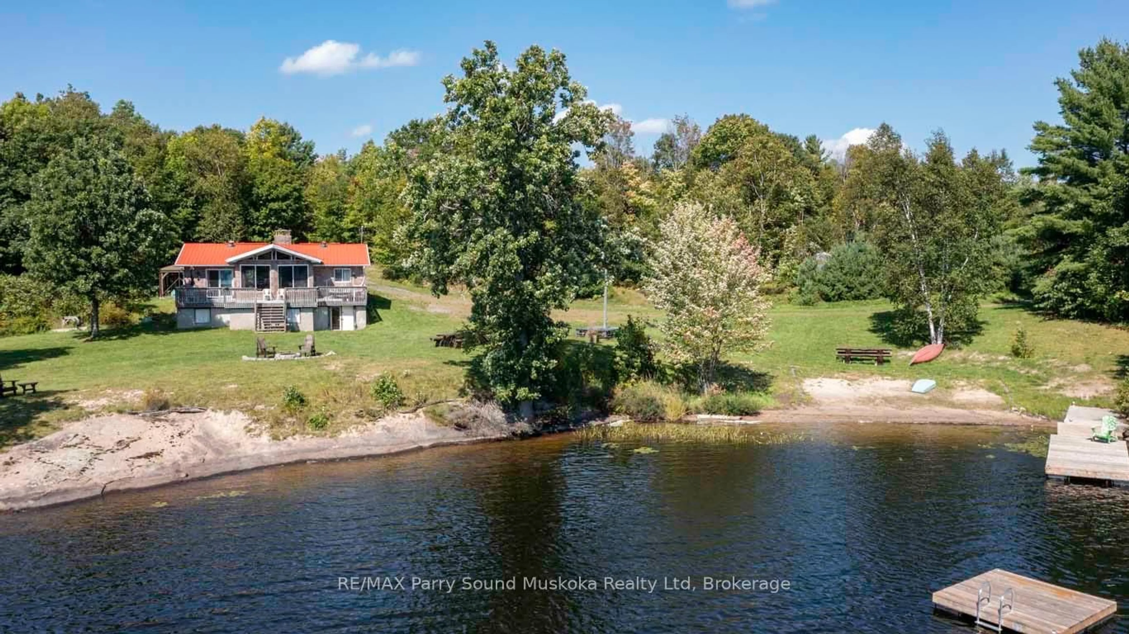 A pic from outside/outdoor area/front of a property/back of a property/a pic from drone, water/lake/river/ocean view for 122 Grey Owl Rd, McKellar Ontario P2A 0B5