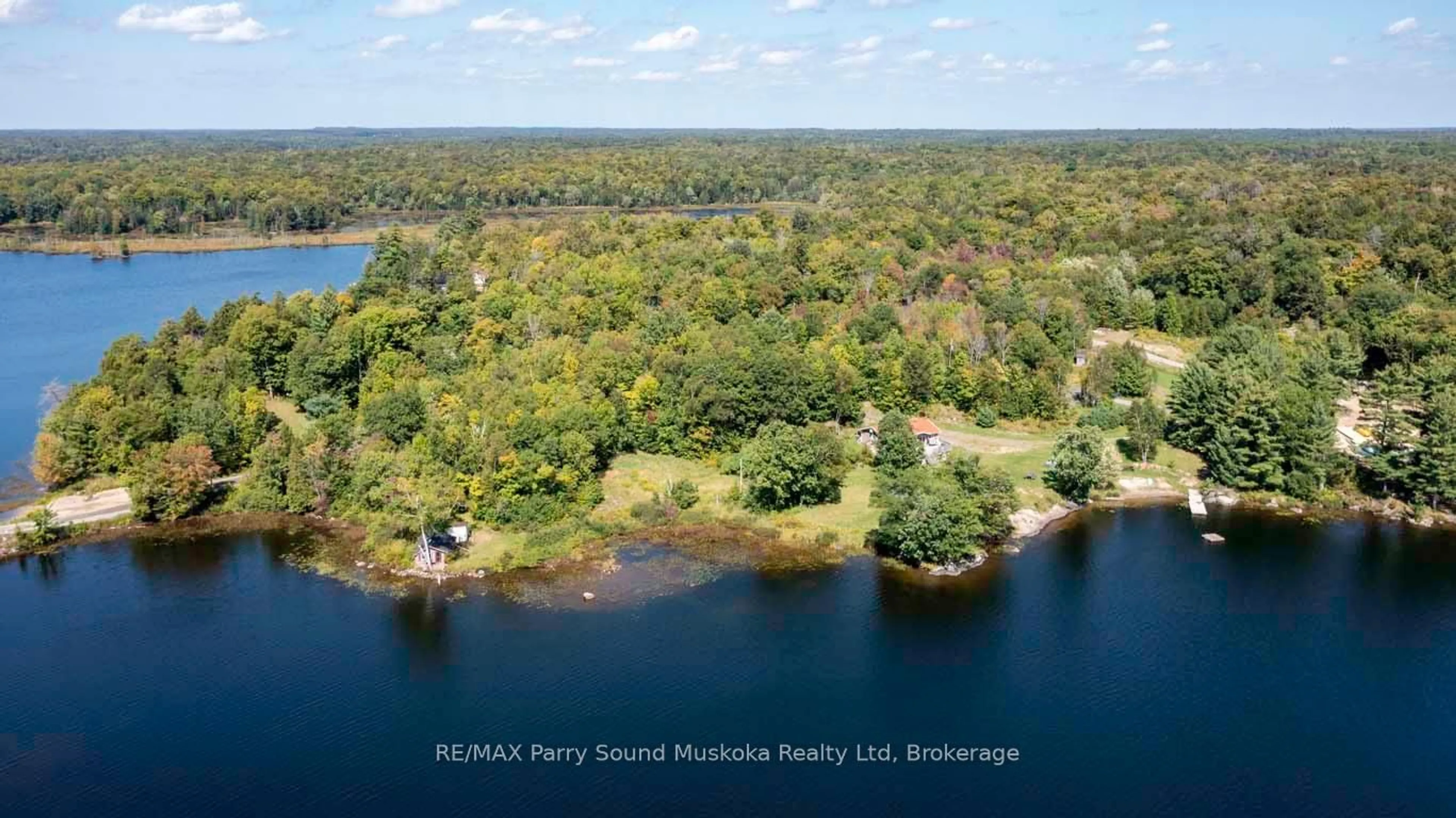 A pic from outside/outdoor area/front of a property/back of a property/a pic from drone, water/lake/river/ocean view for 122 Grey Owl Rd, McKellar Ontario P2A 0B5