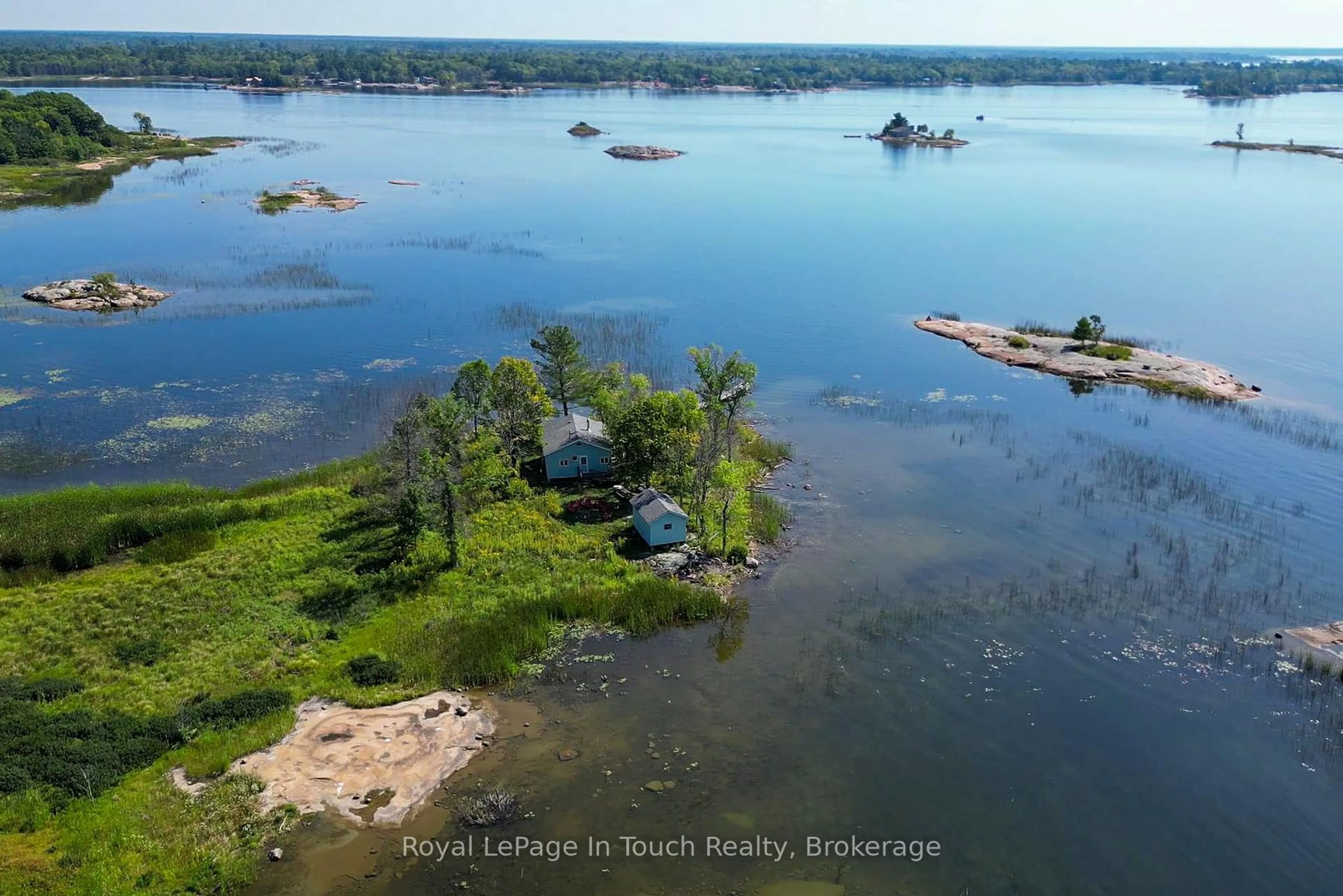 A pic from outside/outdoor area/front of a property/back of a property/a pic from drone, water/lake/river/ocean view for 2 Island 1110 N/A, Georgian Bay Ontario P0E 1E0