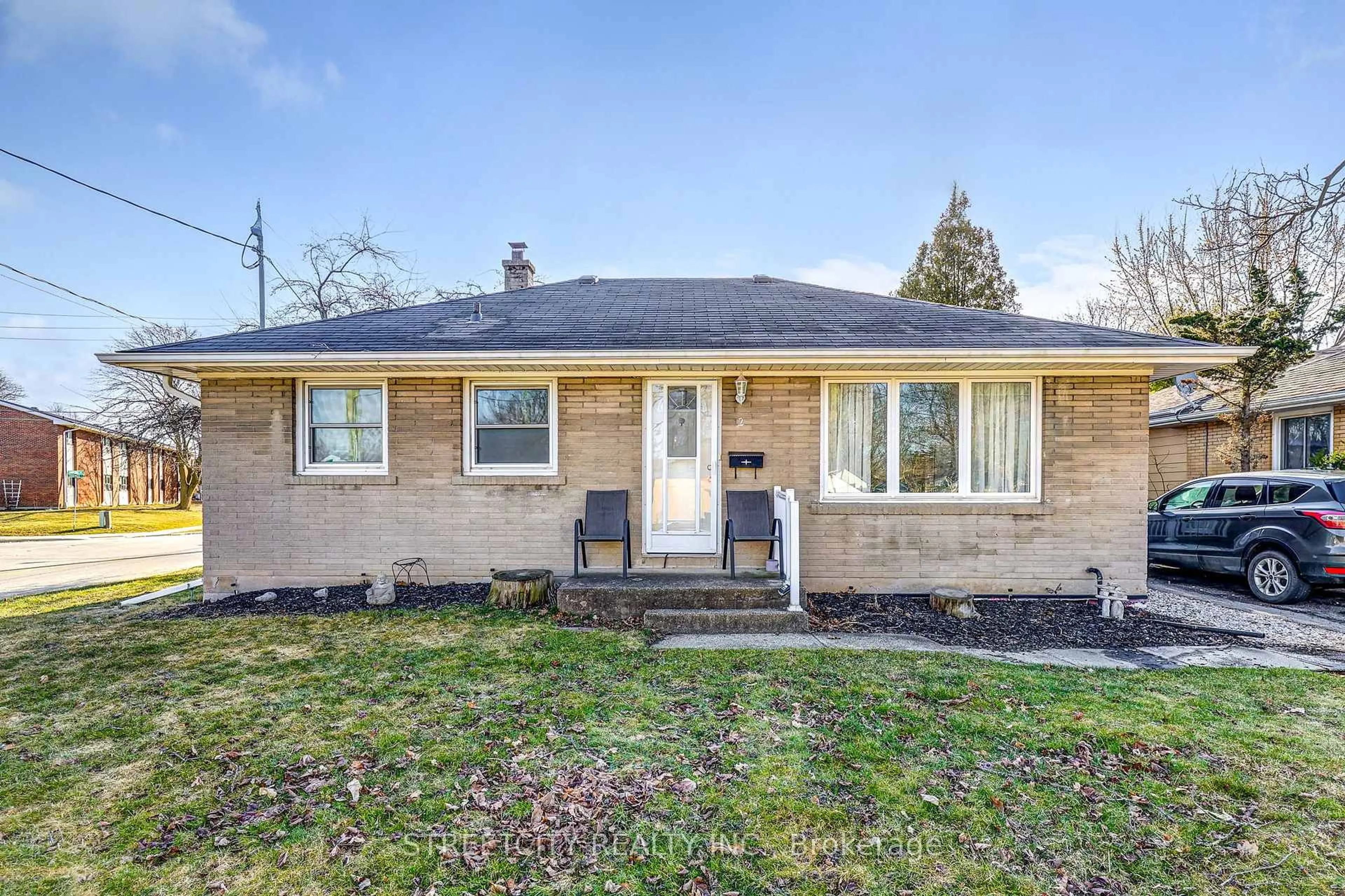 Home with brick exterior material, street for 2 Meehan St, St. Thomas Ontario N5R 4K5