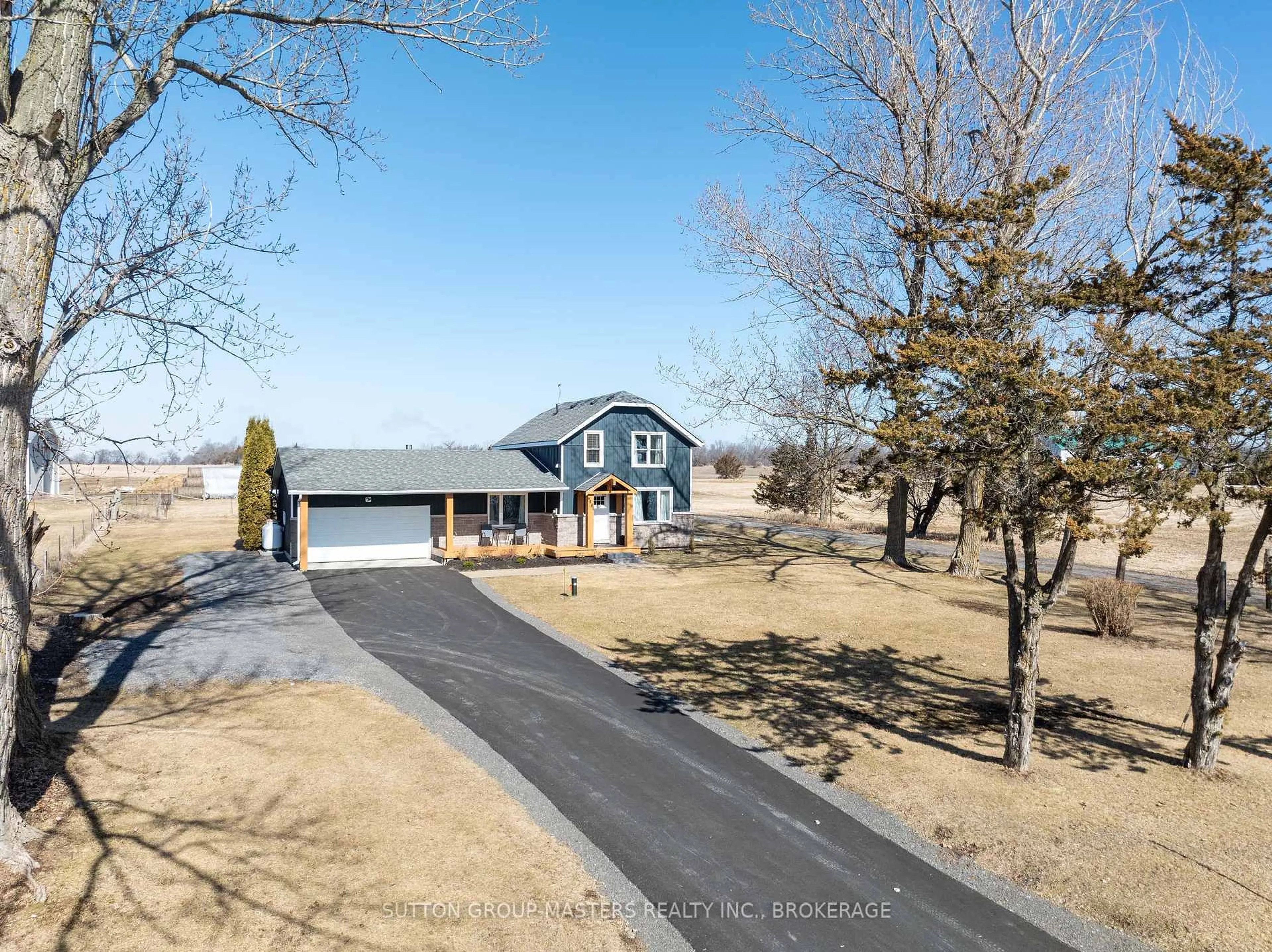 A pic from outside/outdoor area/front of a property/back of a property/a pic from drone, street for 6881 Loyalist Pkwy, Bath Ontario K0H 1G0