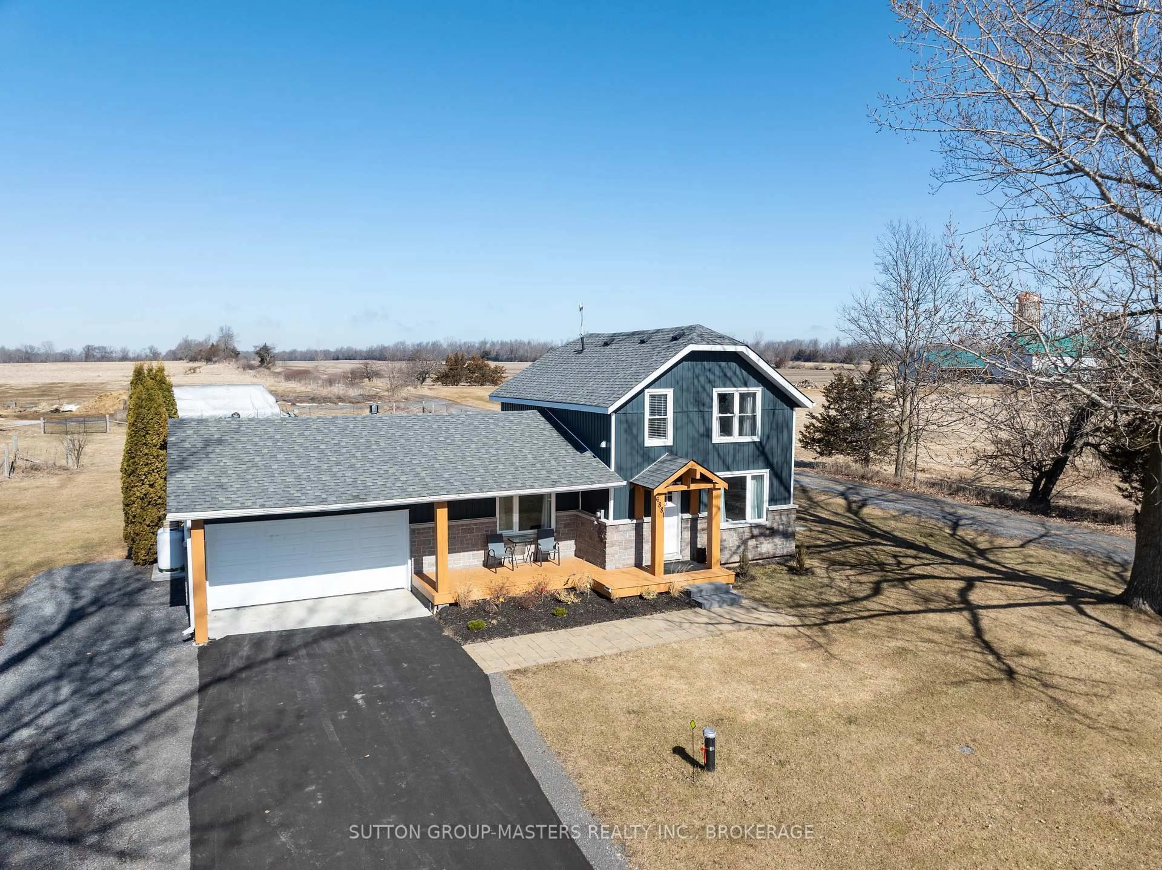 A pic from outside/outdoor area/front of a property/back of a property/a pic from drone, water/lake/river/ocean view for 6881 Loyalist Pkwy, Bath Ontario K0H 1G0