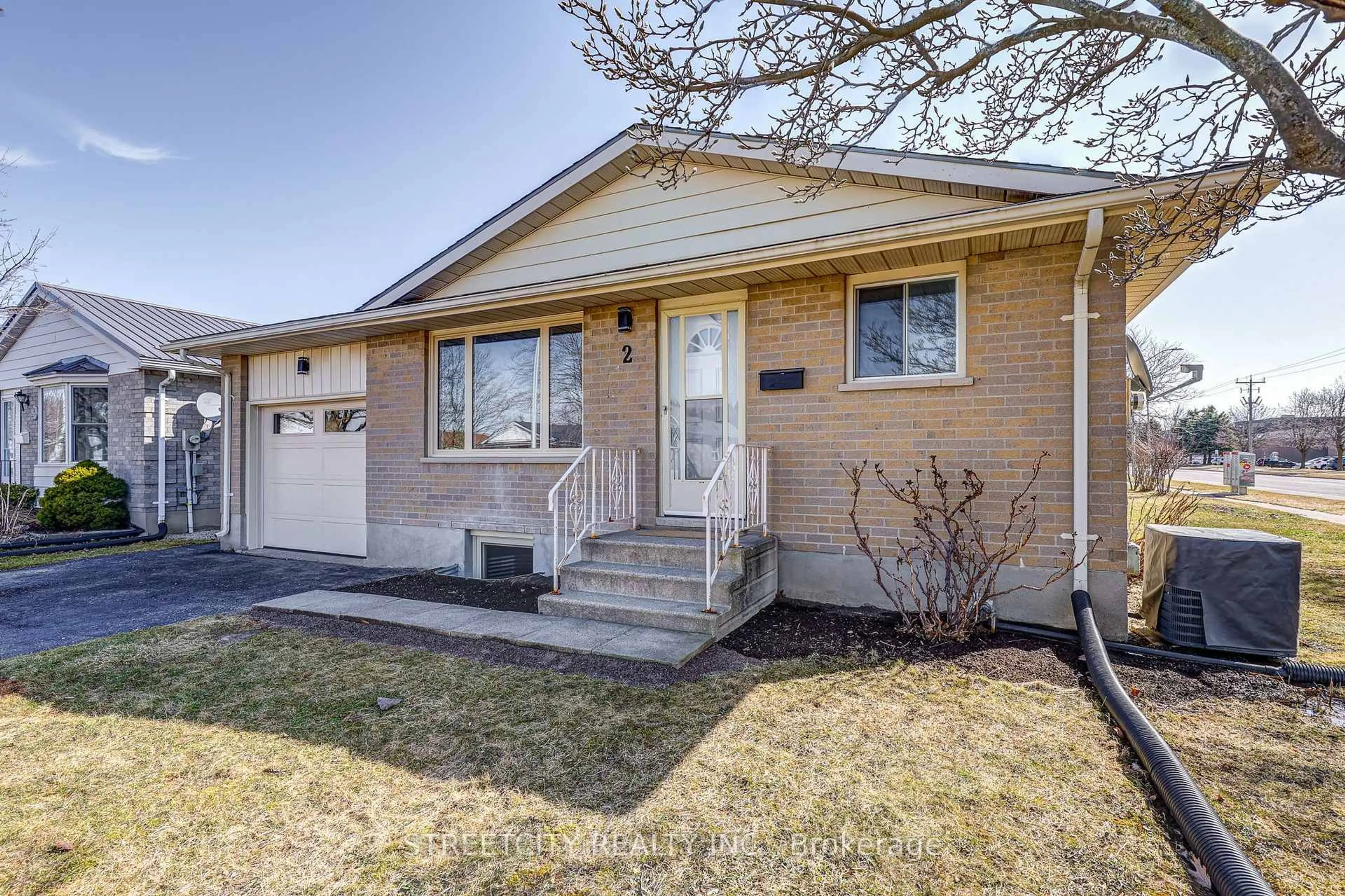 Home with brick exterior material, street for 2 Ripley Lane, St. Thomas Ontario N5R 5X1