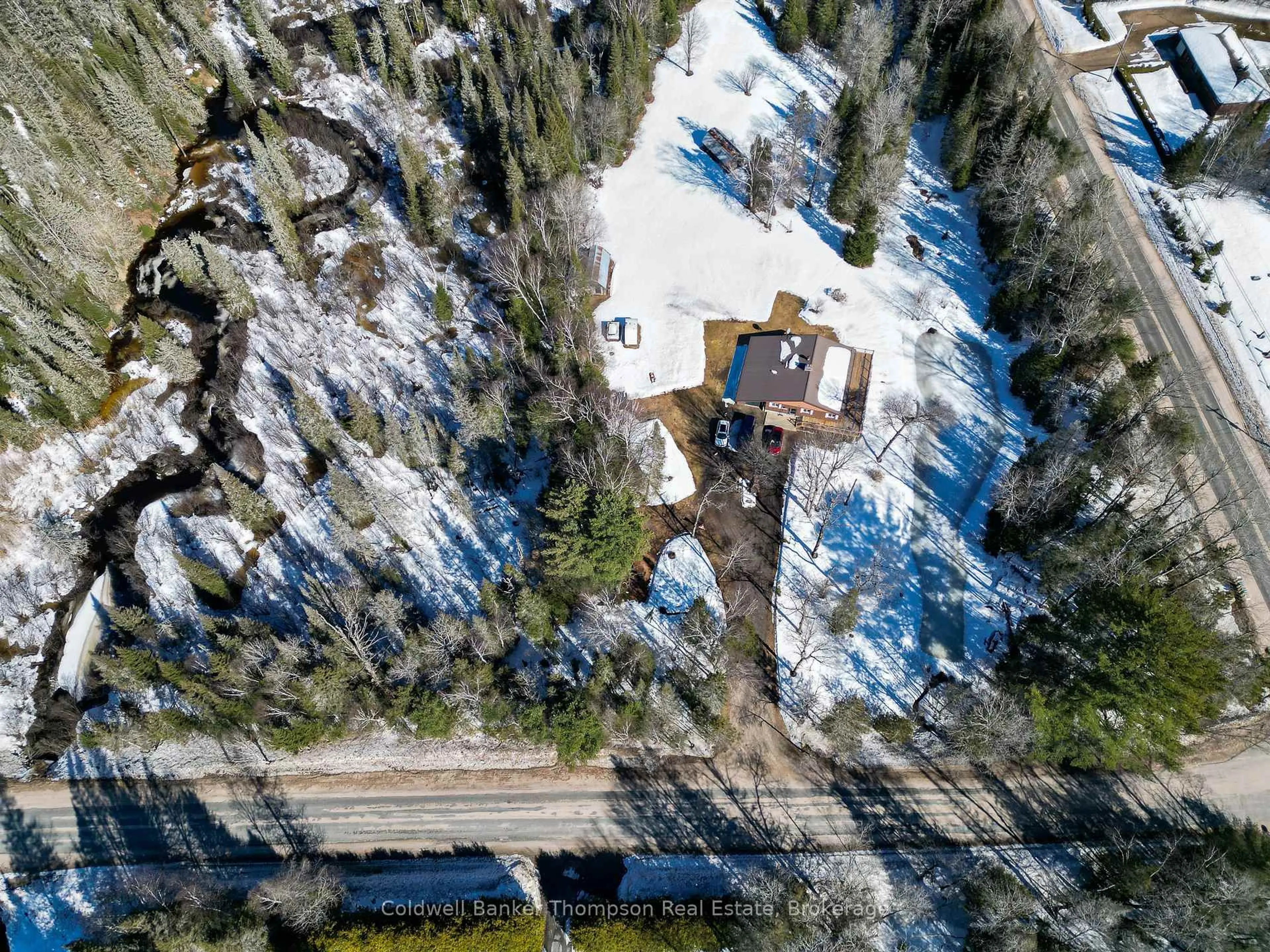 A pic from outside/outdoor area/front of a property/back of a property/a pic from drone, street for 15 Municipal Rd, Machar Ontario P0A 1X0