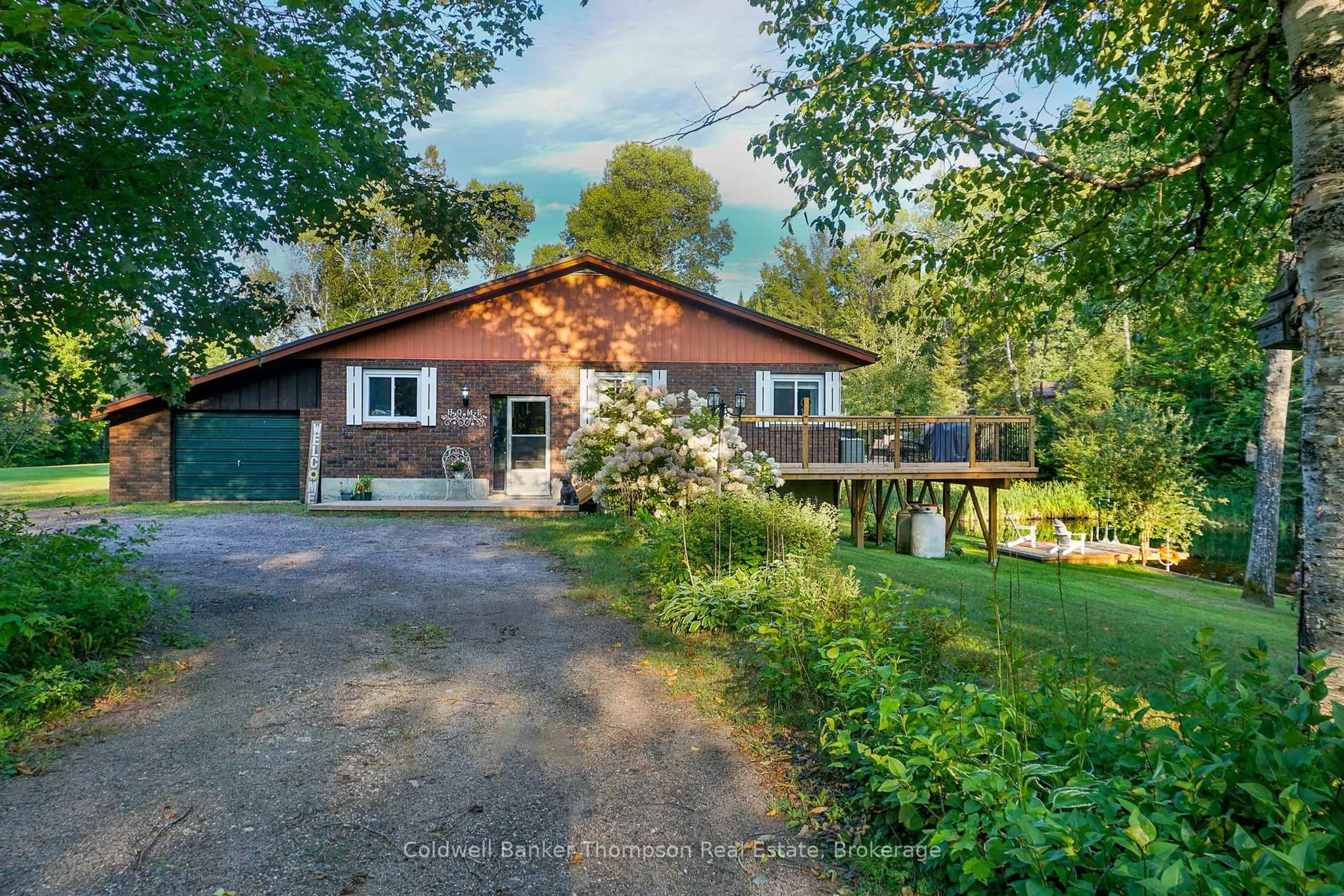 A pic from outside/outdoor area/front of a property/back of a property/a pic from drone, unknown for 15 Municipal Rd, Machar Ontario P0A 1X0